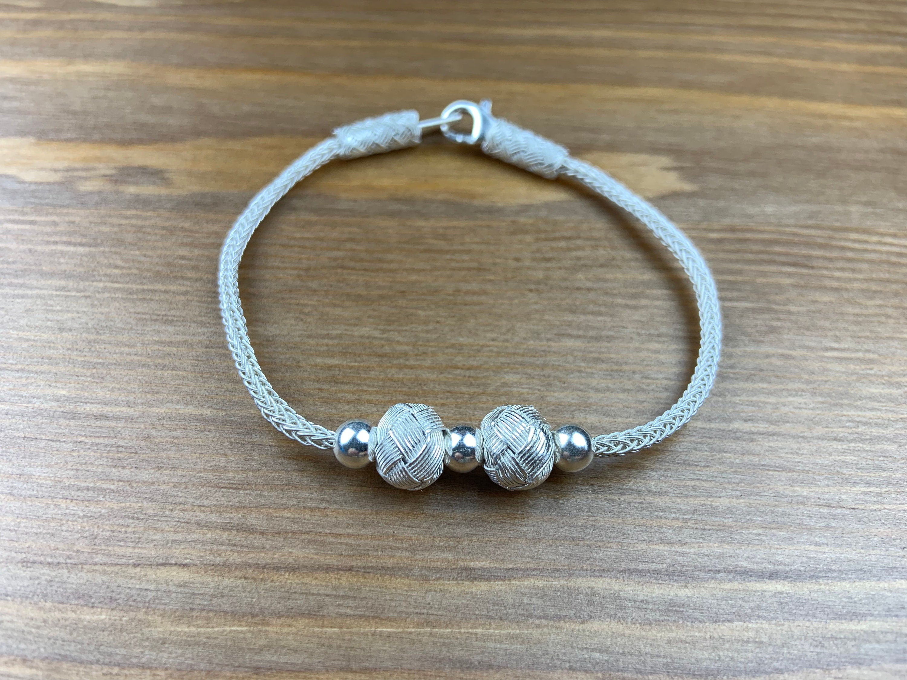 Find the perfect gift for your loved ones this Mothers Day with a handmade silver wire bracelet from Kazaziye Art Bangle.