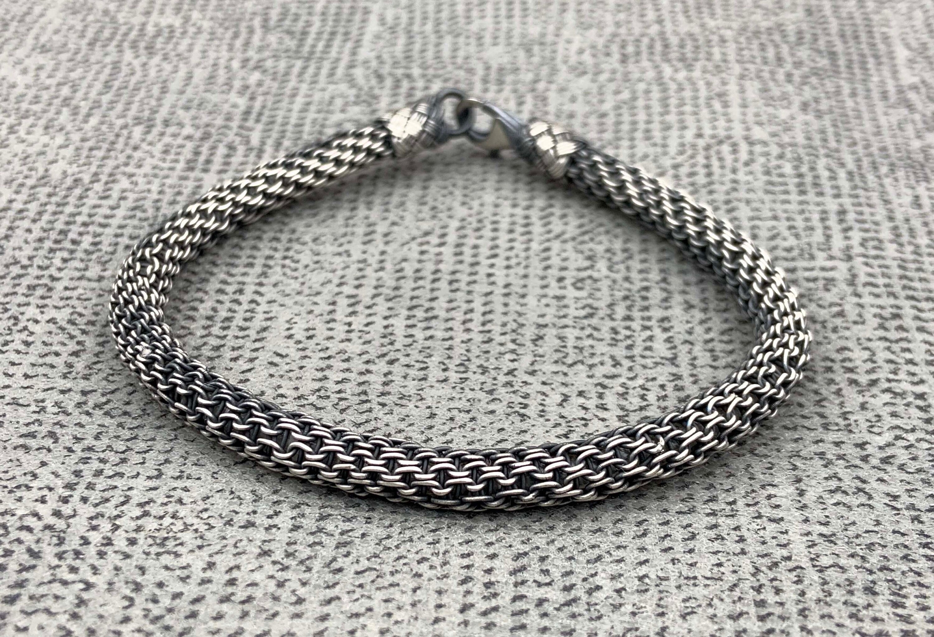 If you're looking for the perfect gift for your grandfather, then look no further! Our range of silver bracelet men and unisex bracelets is sure to please. Add a touch of luxury to his outfit with a handmade bracelet.