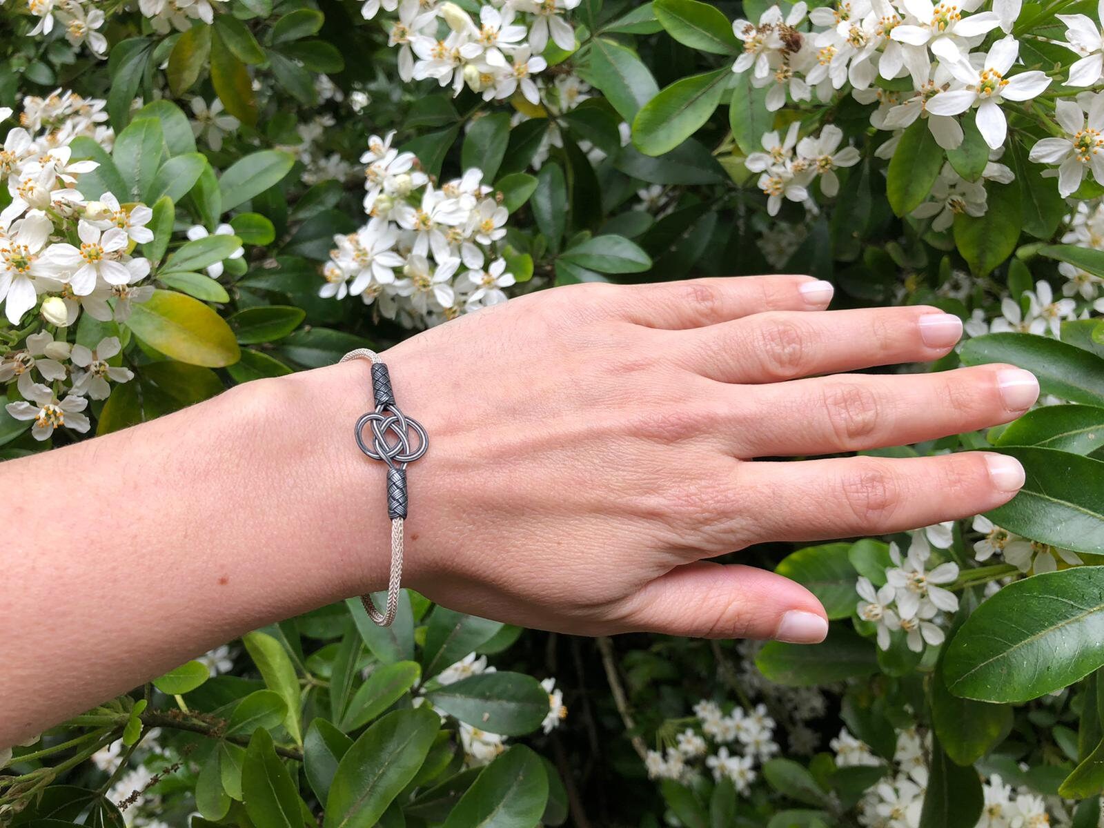 Sterling Silver and Black Braided Bracelet - Elegant Knot Design