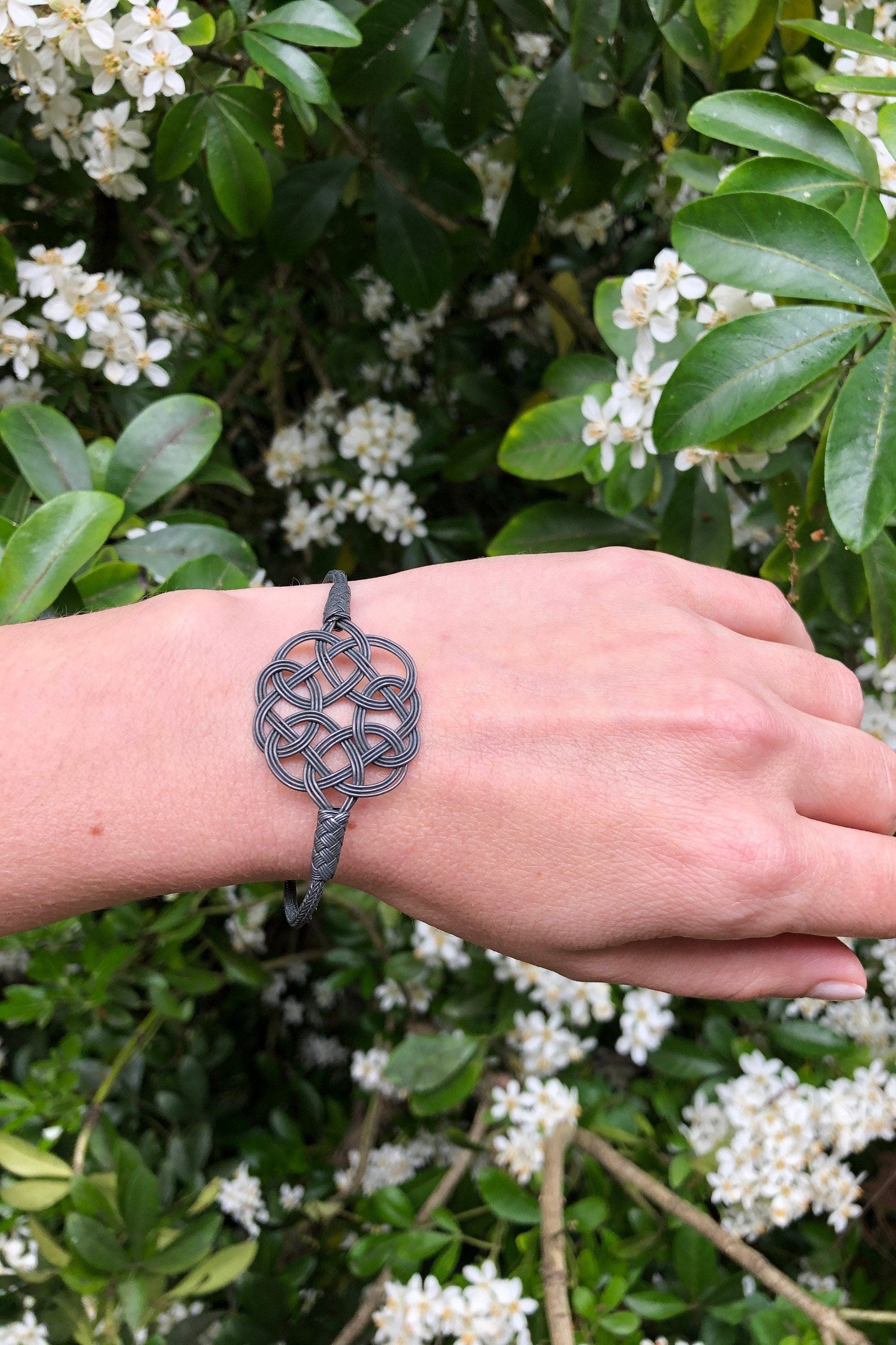 Midnight Mystique: Black Sterling Silver Braided Knot Bracelet