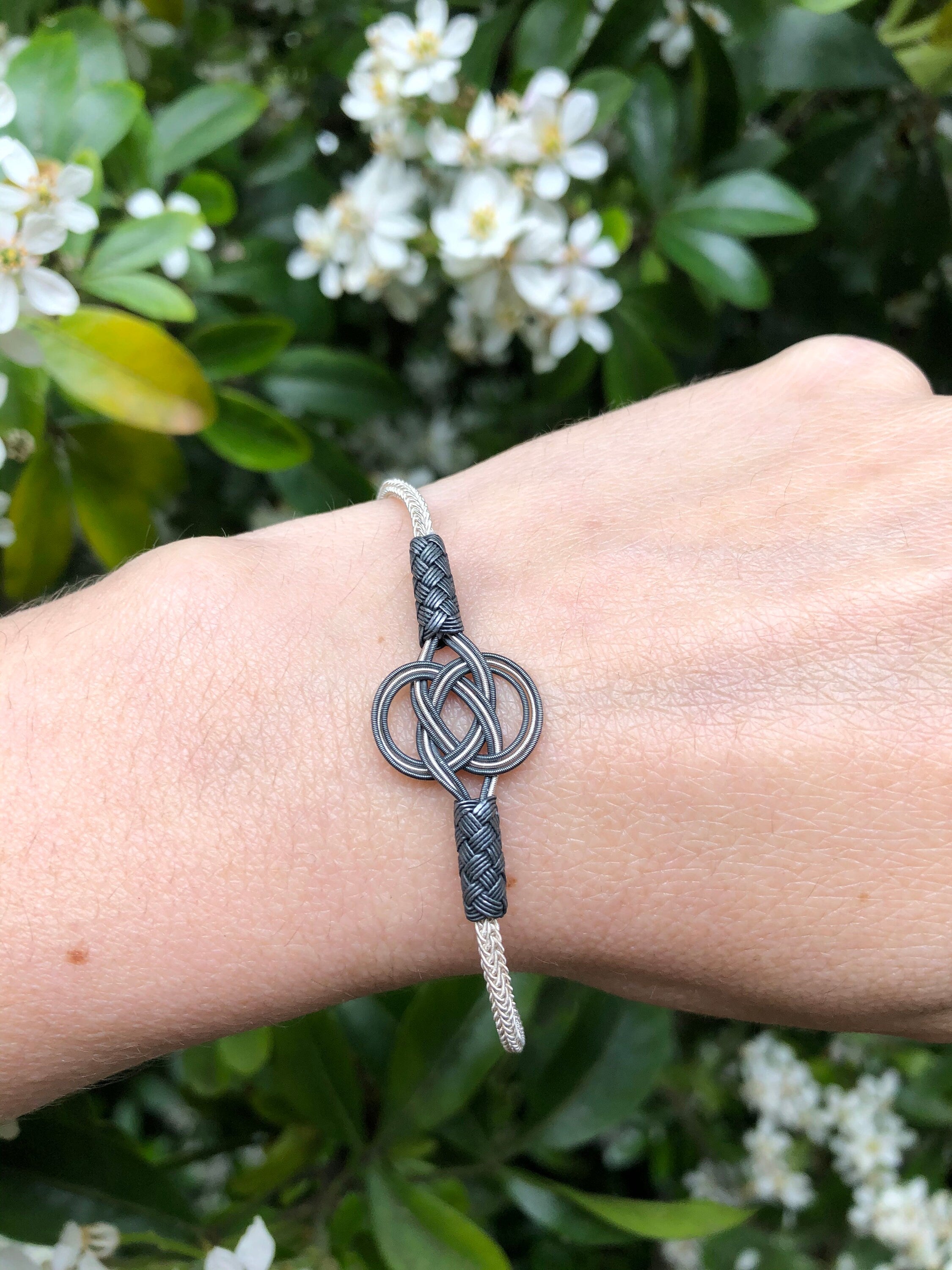 Sterling Silver and Black Braided Bracelet - Elegant Knot Design