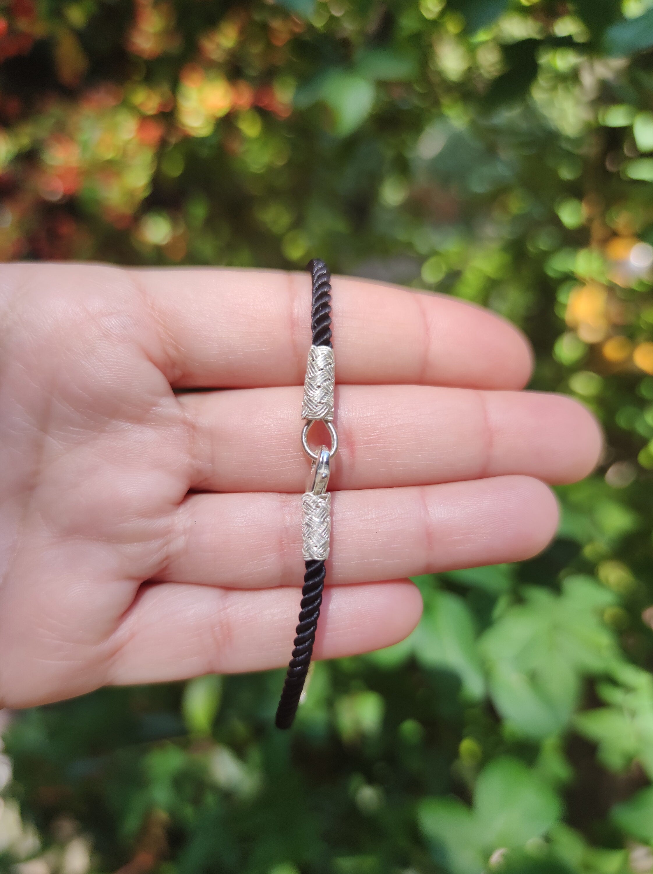 If you're looking for a thin wristband that can be dressed up or down, try the String Bracelet. It works well with any outfit, and can be worn casually or for an extra special occasion.