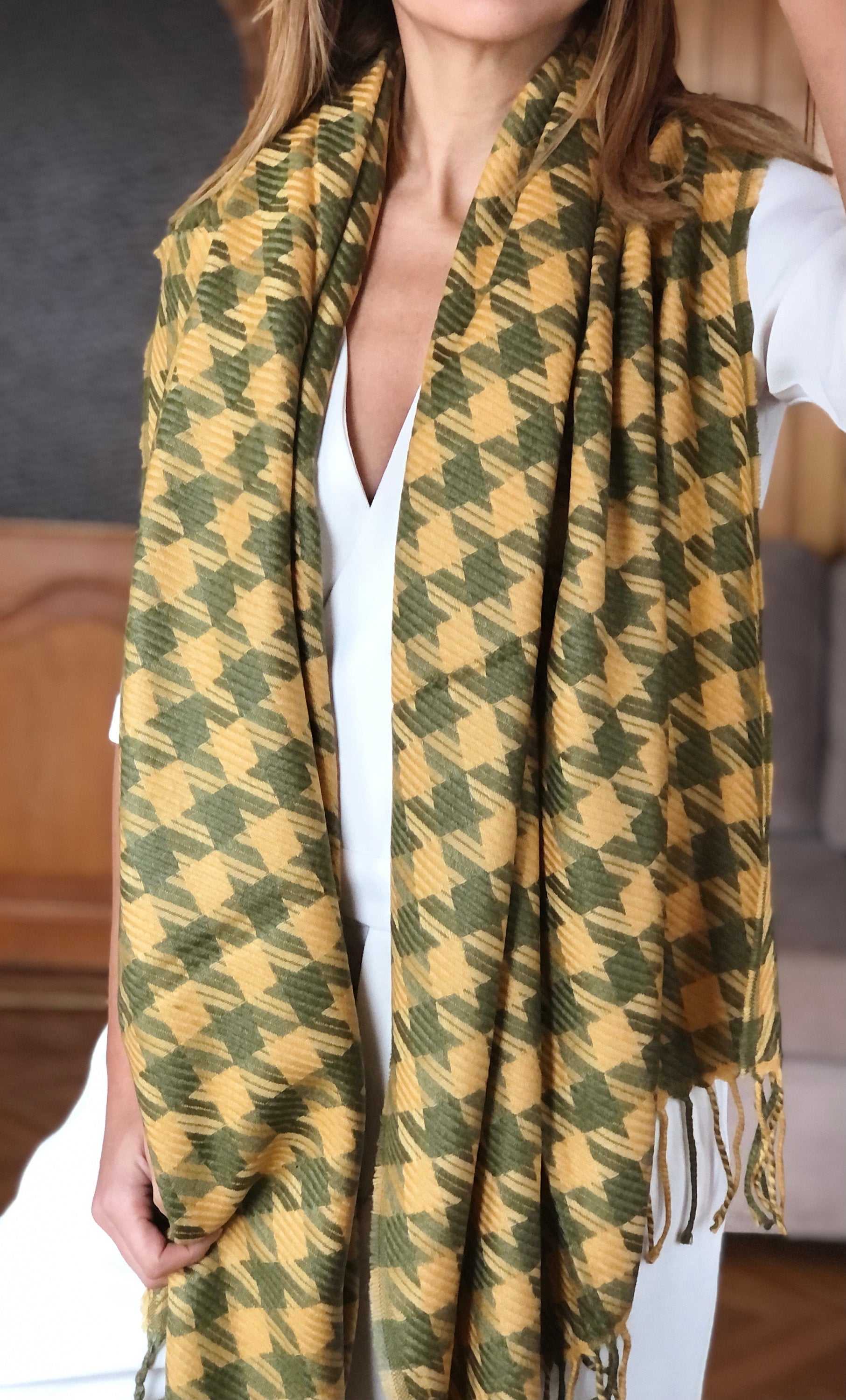 Stay warm and fashionable with this stunning shawl, perfect for layering on chilly days.