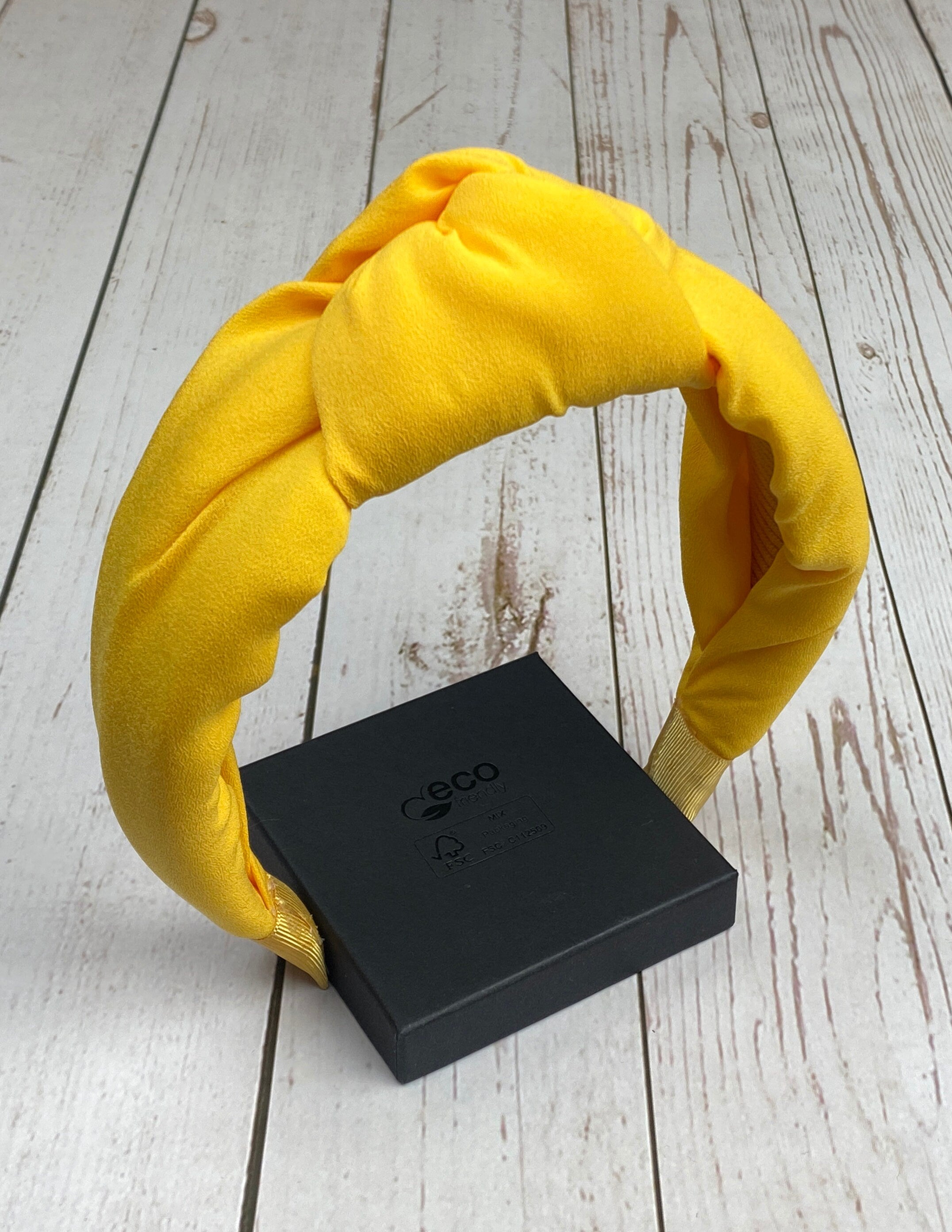 Whether you're running errands or attending a special event, our Light Yellow Women Classic Headband is the perfect accessory! Its timeless design and versatile color make it a must-have for any fashion-forward woman.