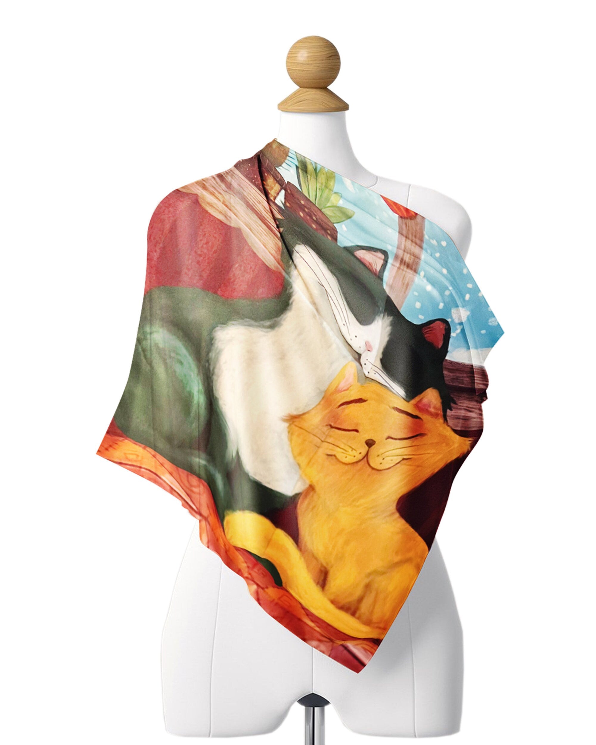 We also have a range of other stylish bags, accessories, and scarves that would make the perfect gift for any cat lover out there!