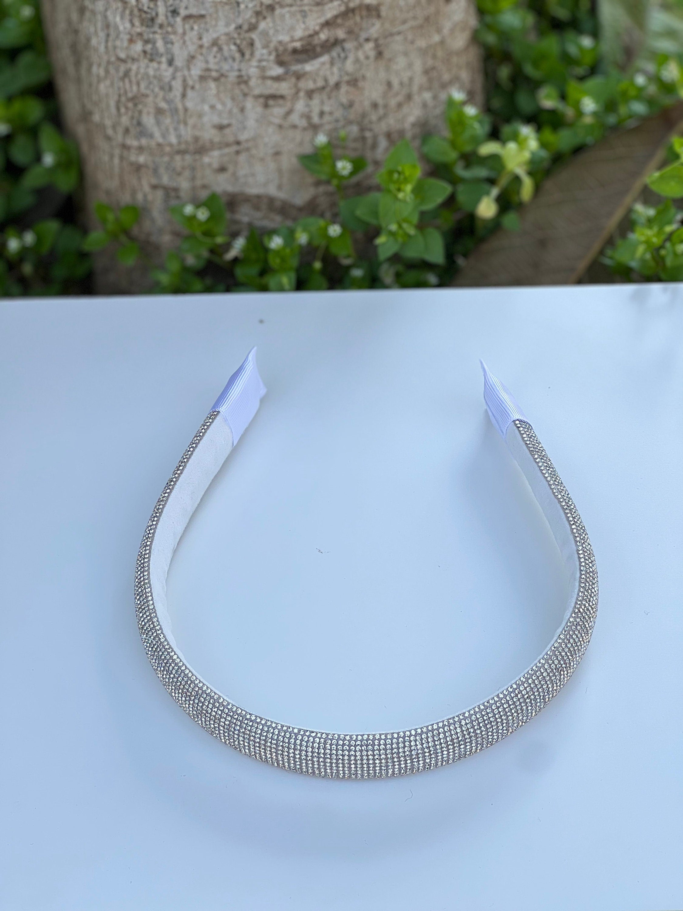 Add a touch of glamour to your bridal look with this boho wedding hair piece, featuring sparkling crystals.