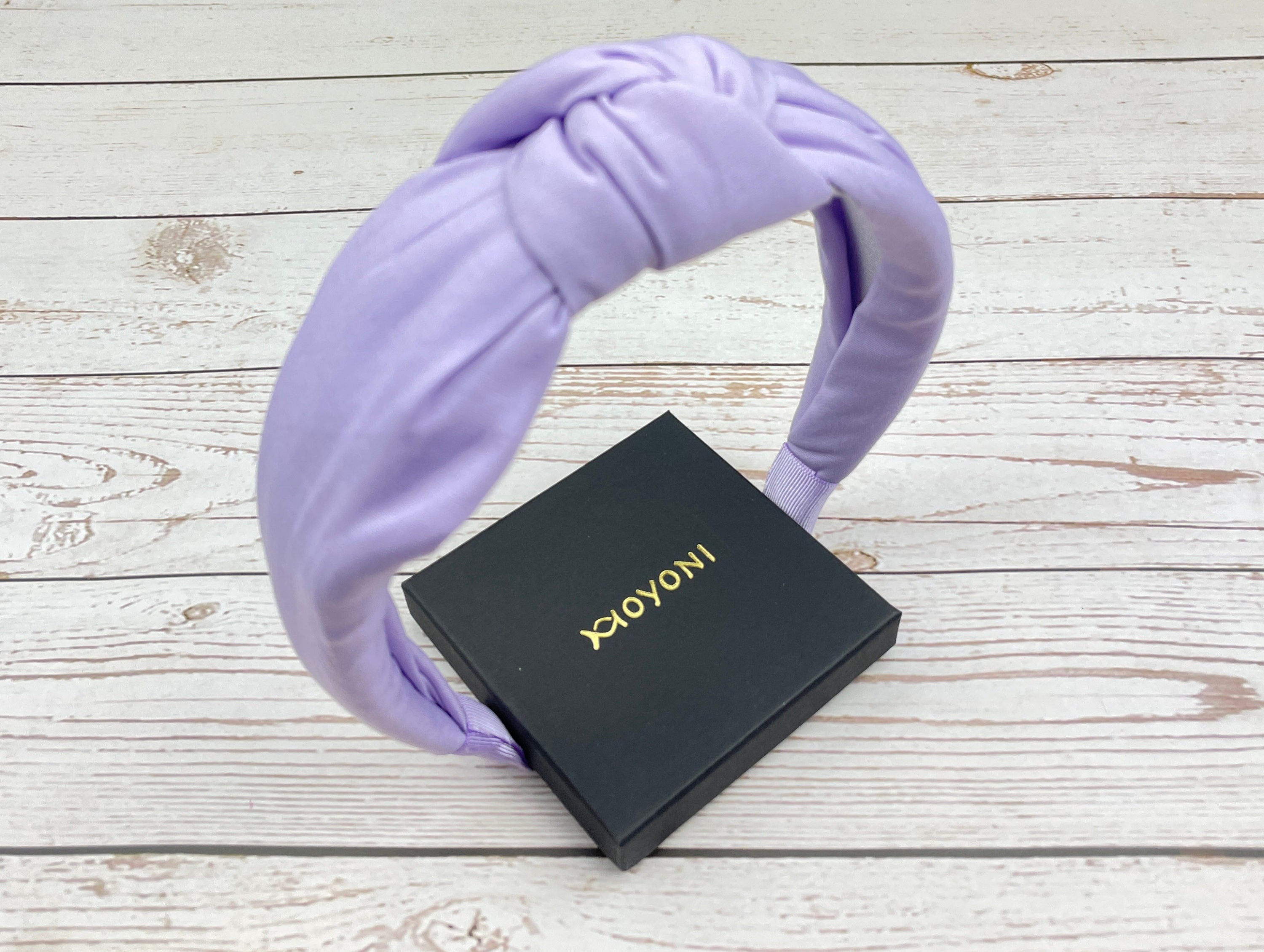 This beautiful lavender twist headband is perfect for adding a touch of femininity to your look. The twist design adds a unique touch to any hairstyle, making it perfect for both casual and formal occasions.