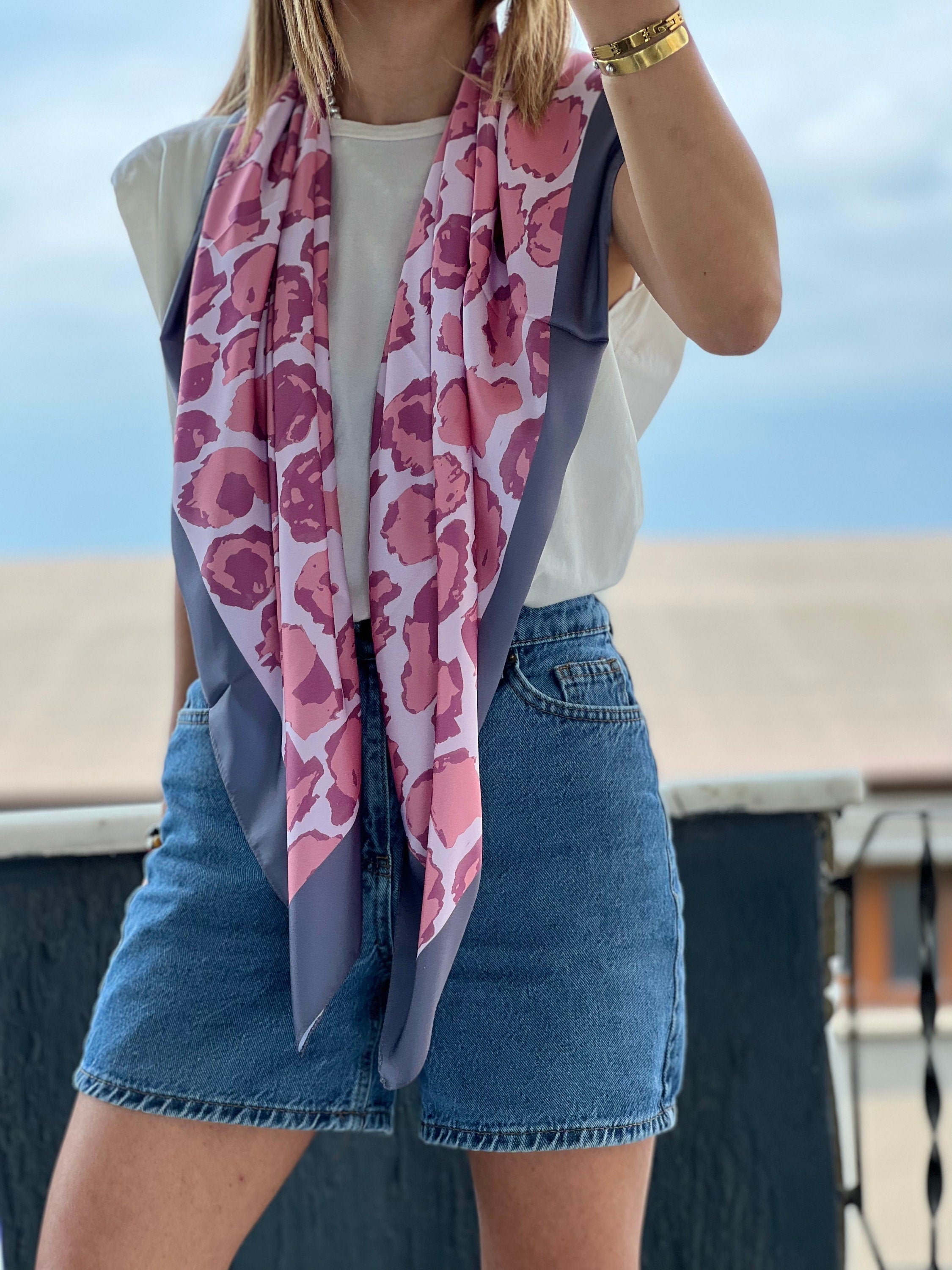 The perfect accessory for any fashion-forward woman, this scarf is a must-have for your collection.