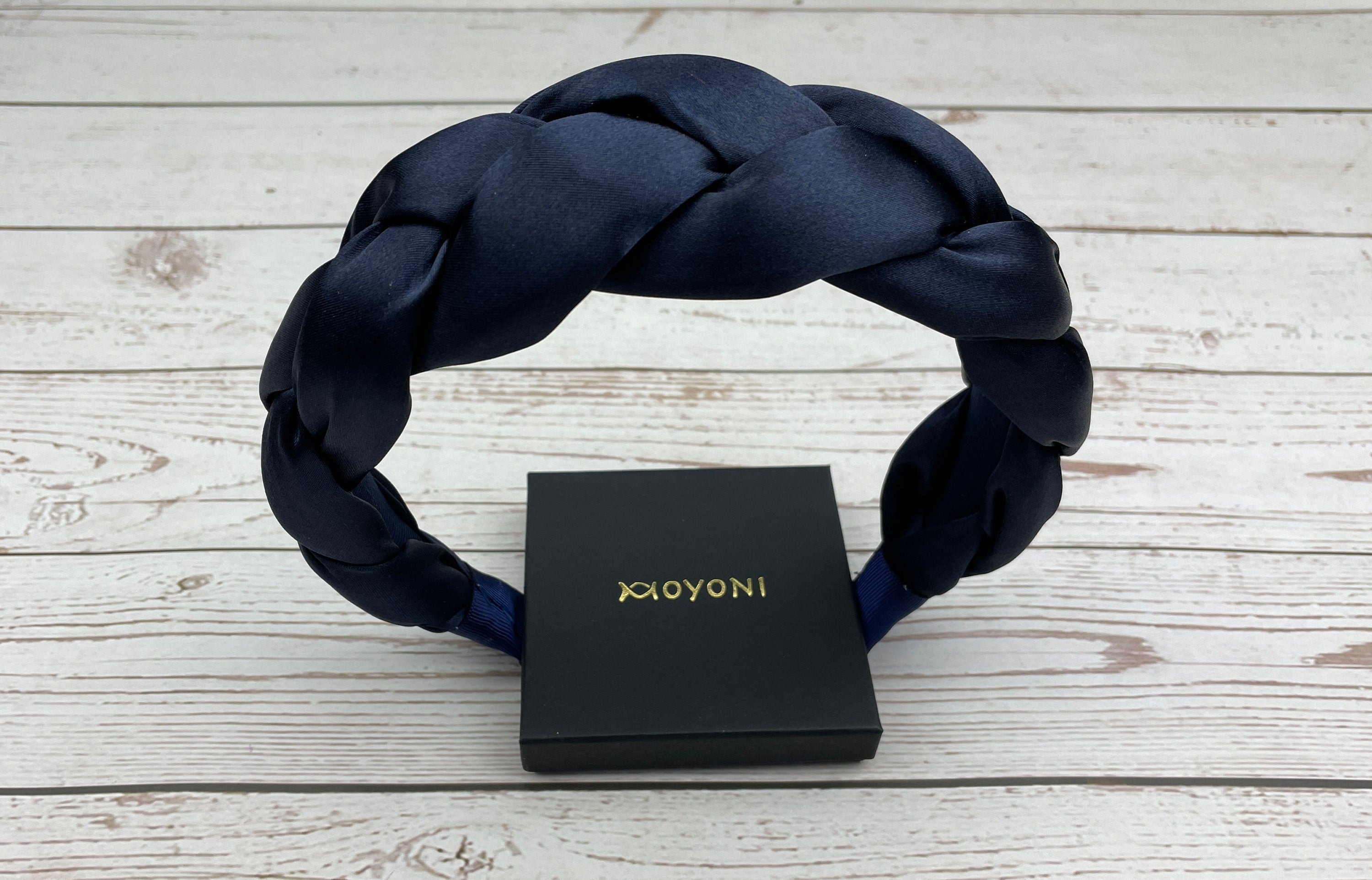 Stay stylish on-the-go with this braided turban headband