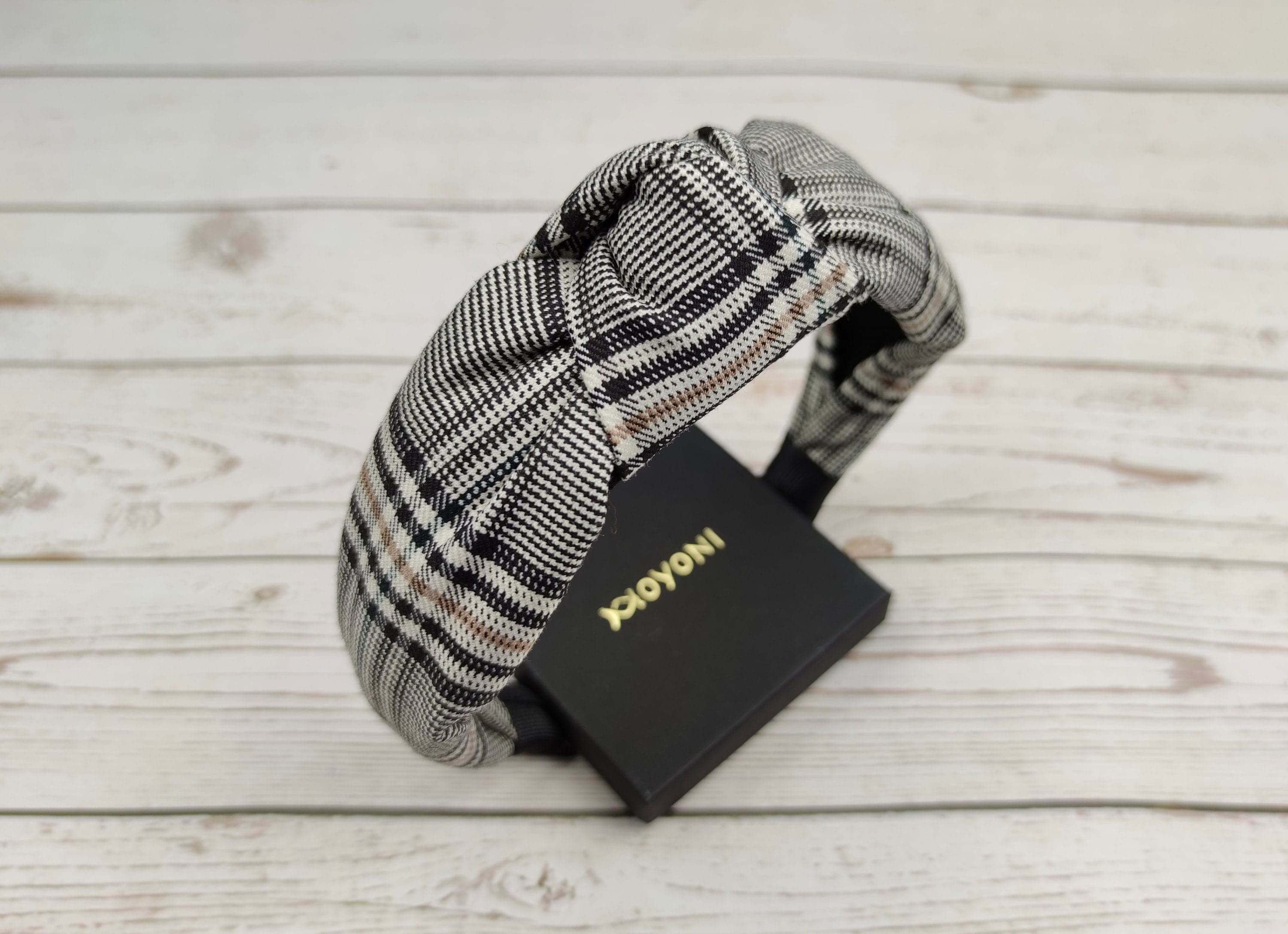 On-Trend Crepe Headband: Enhance your style with this versatile white and black striped headband. Ideal for college girls, it adds a fashionable touch to any outfit.