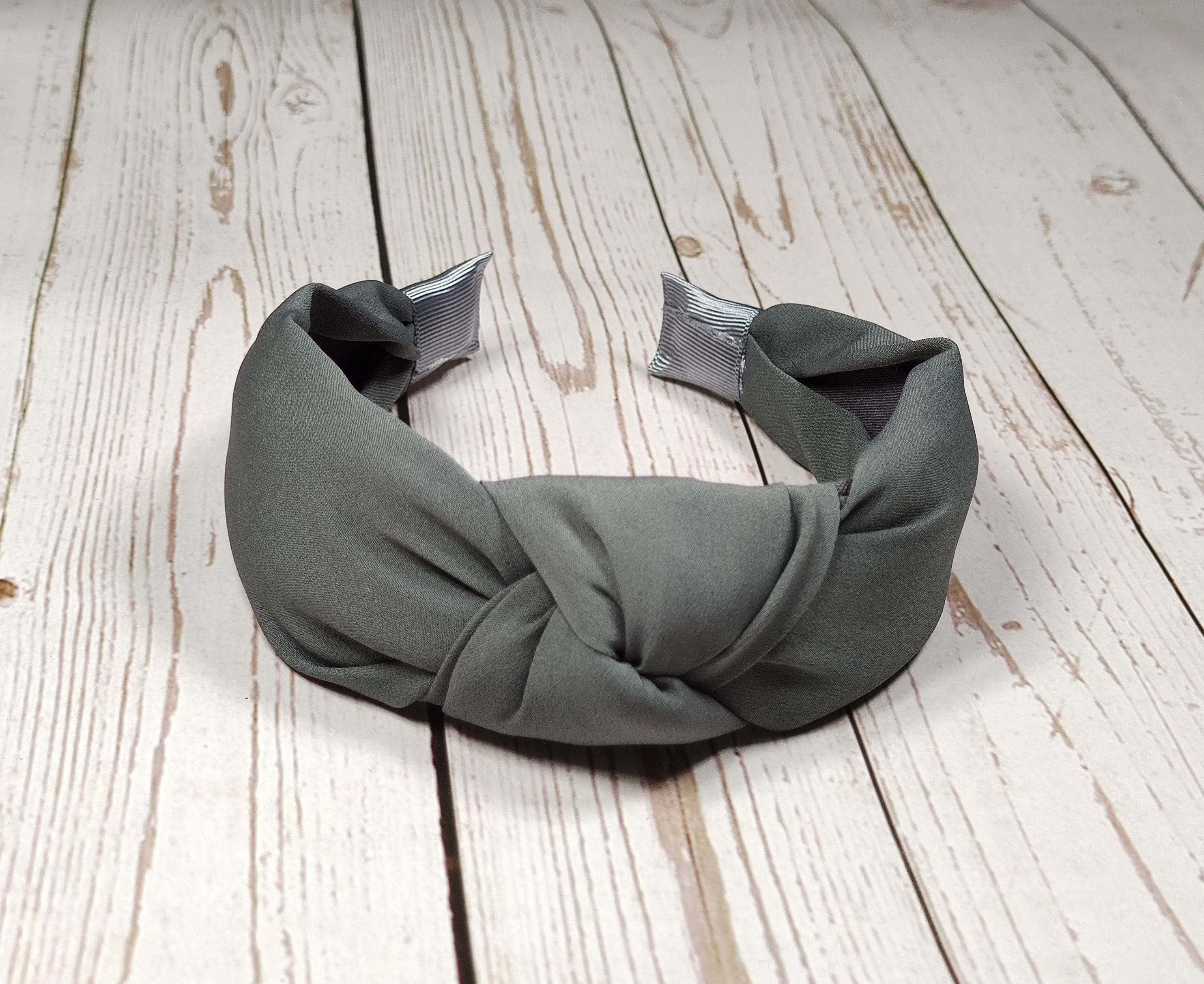 Looking for a stylish and comfortable headband? Check out our collection of satin headbands for women. Whether you're in the mood for a twisted headband or a wide headband, we've got you covered.