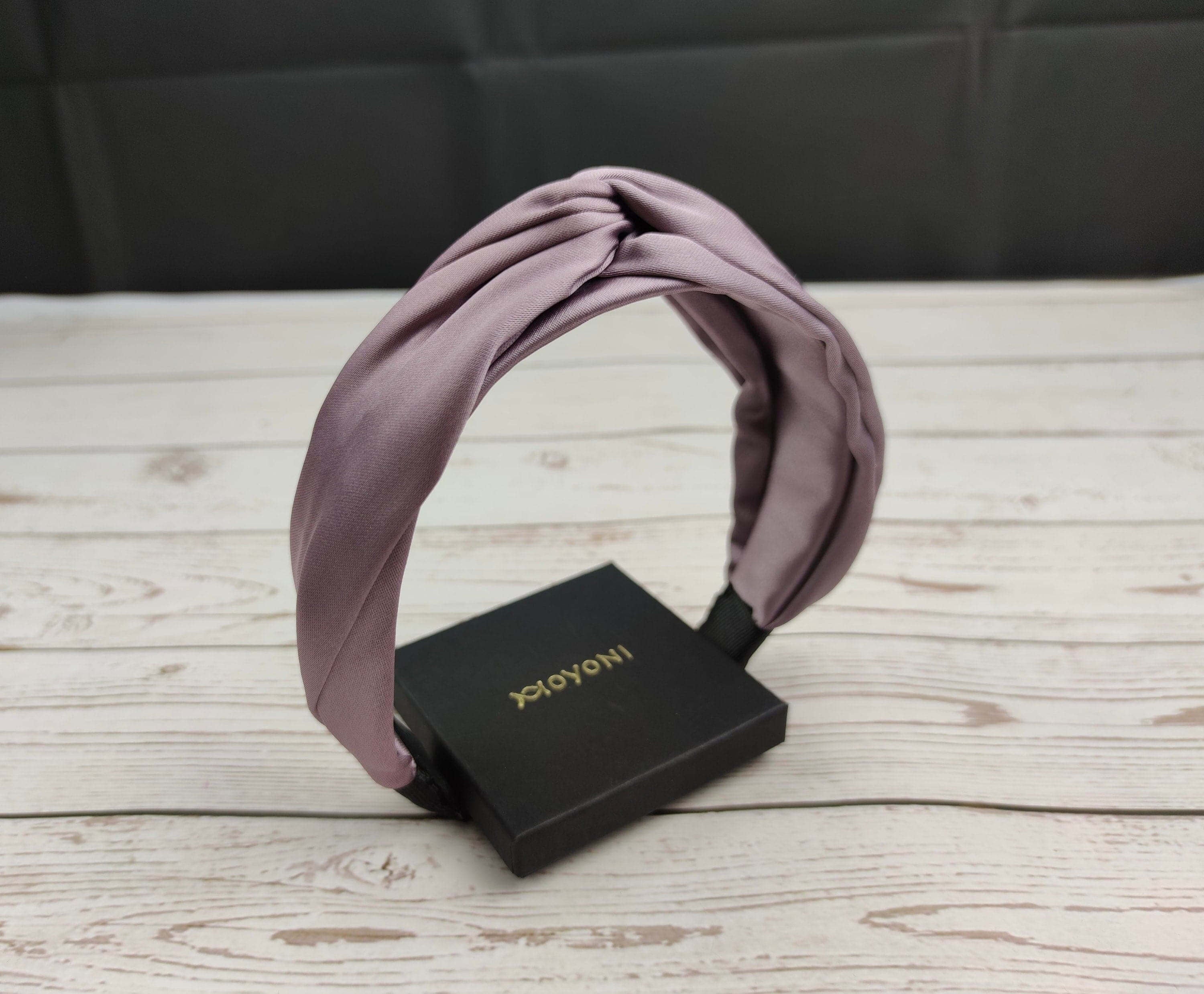 Lilac Satin Knot Headband: A trendy and versatile hair accessory that can be dressed up or down, depending on the occasion.