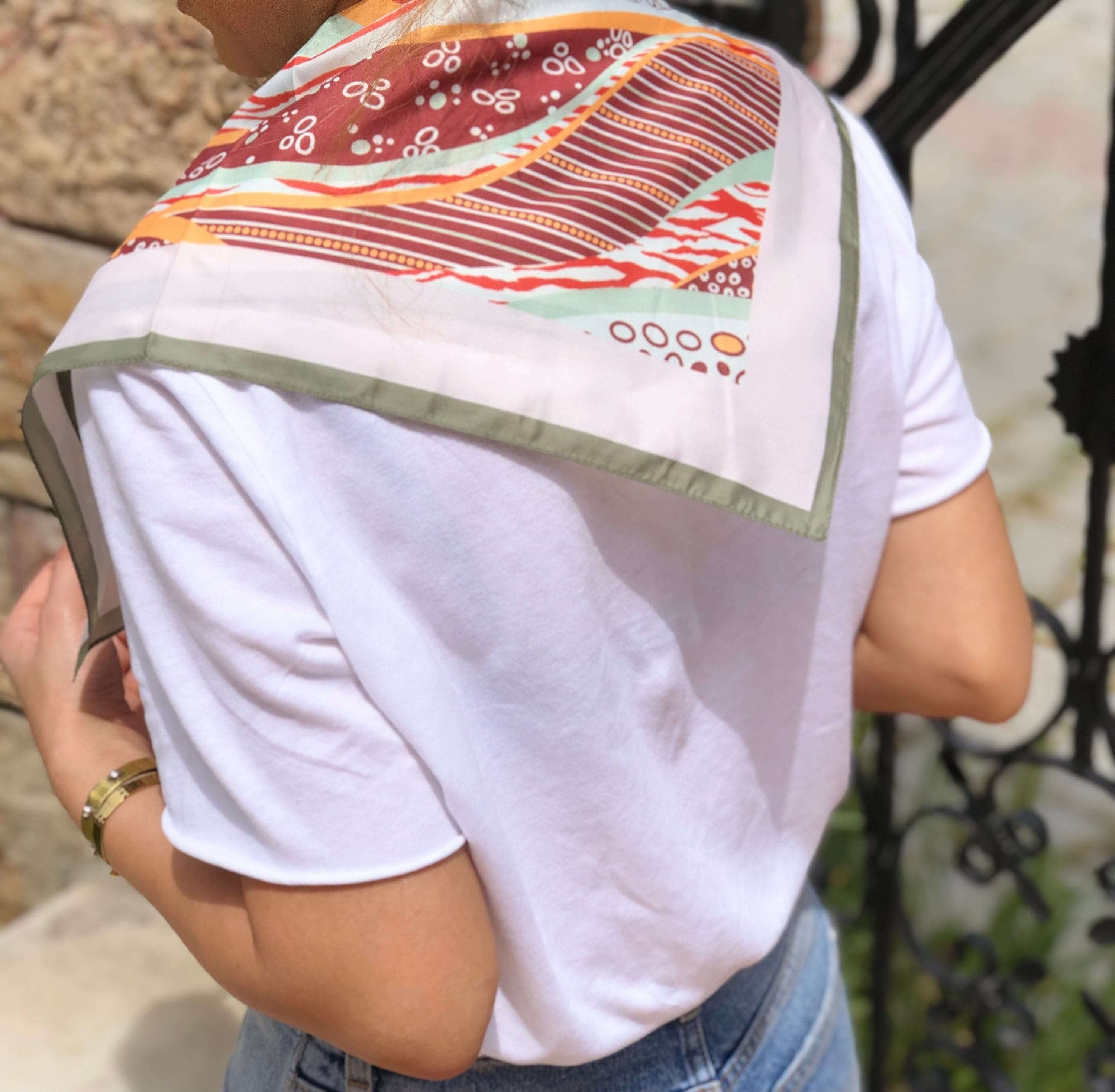 Add a pop of color to your outfit with this colorful head scarf - perfect for adding a touch of fun to any outfit.