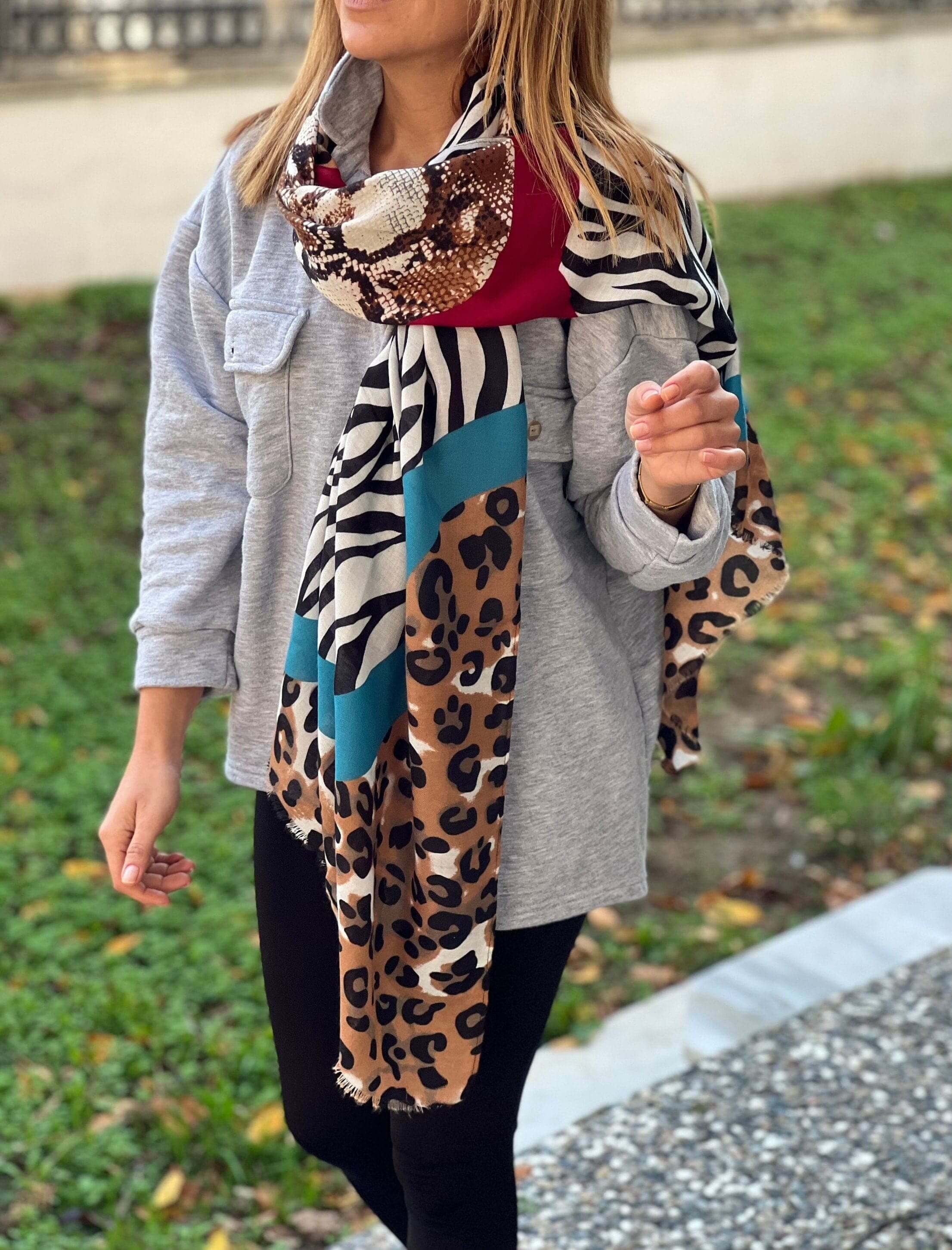 Whether you're dressing up for a night out or running errands around town, this versatile scarf is the perfect accessory. It's lightweight, breathable, and easy to wear, making it ideal for any occasion.