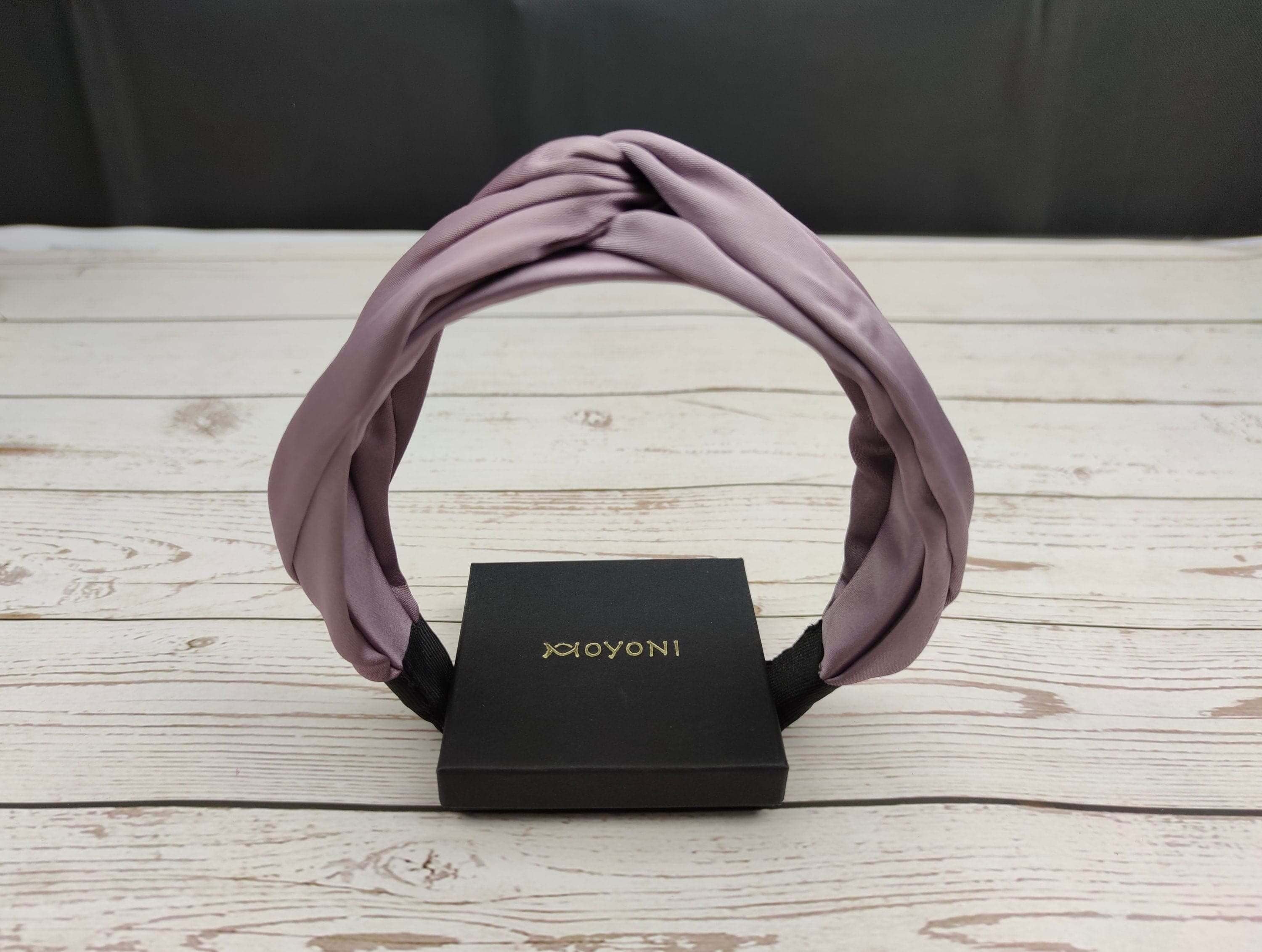 Chic Lilac Hair Accessory: This satin headband is a must-have for any fashion-conscious woman who loves to accessorize her hair.