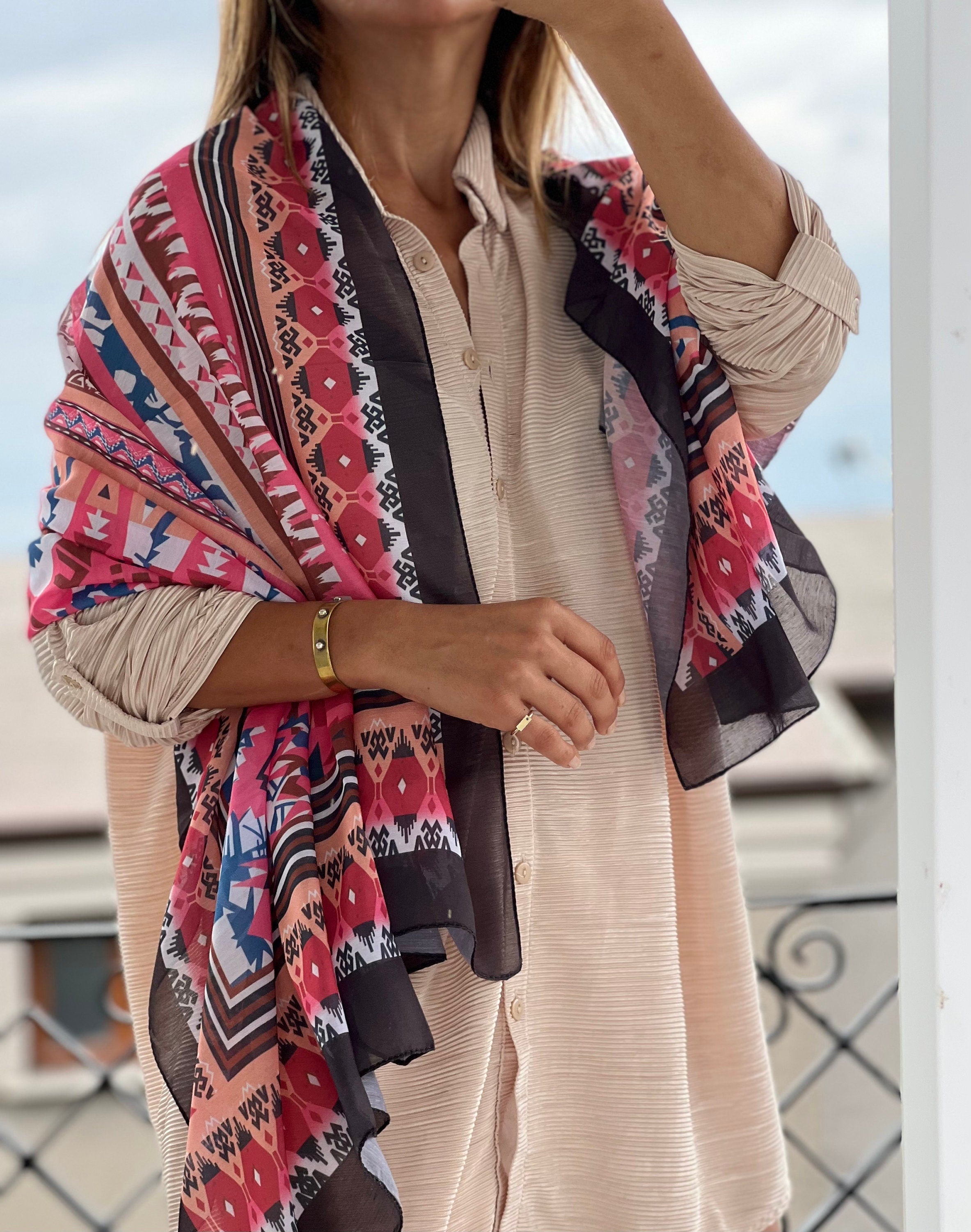 Elevate your wardrobe with this Large Cotton-Viscose blend voile scarf in a beautiful pink, green, and black color scheme. All-season compatible and featuring an authentic pattern, this scarf is the perfect accessory for any outfit.