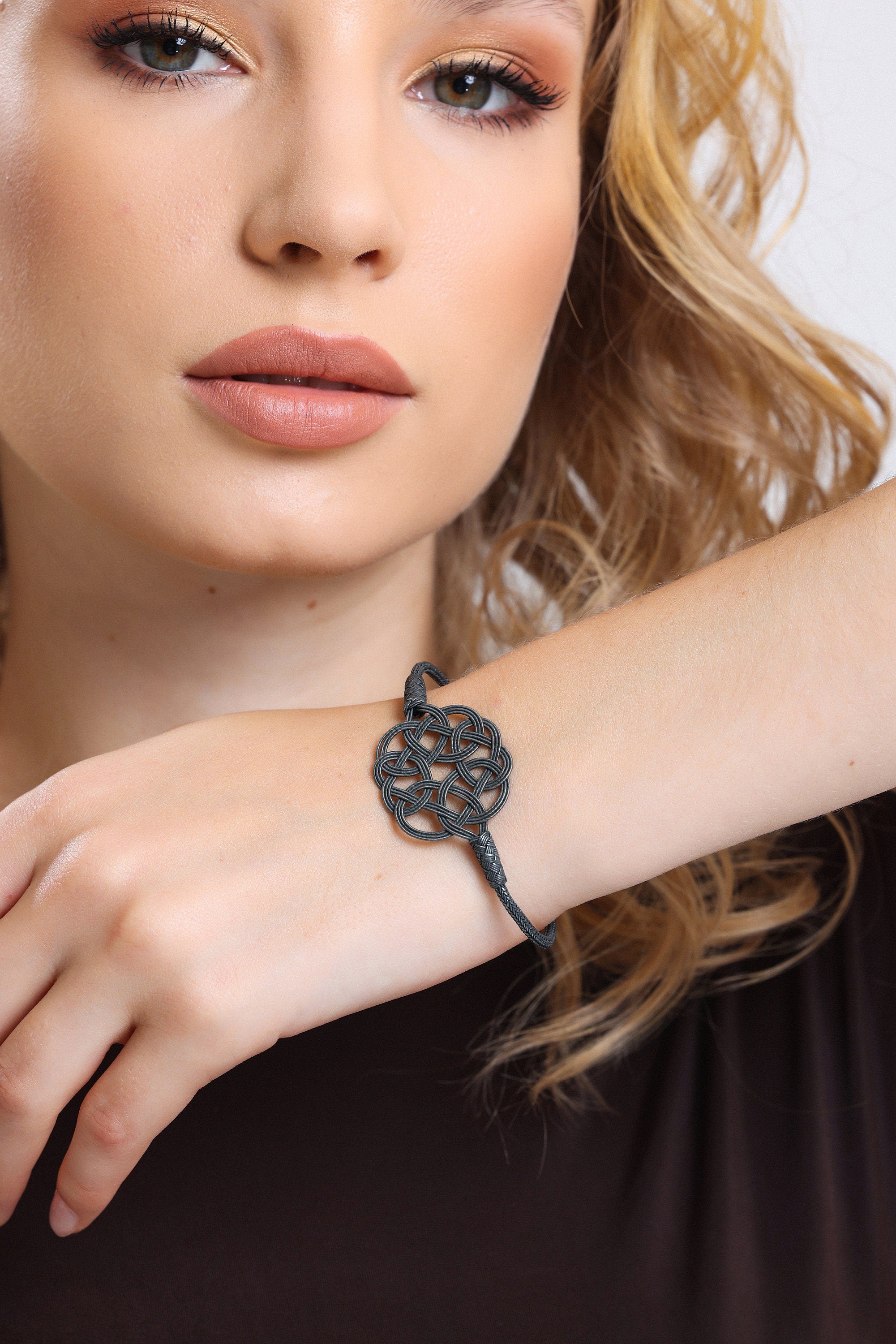 Midnight Mystique: Black Sterling Silver Braided Knot Bracelet