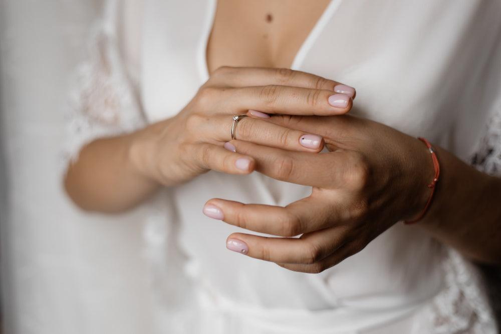 Collection of unique handmade rings crafted with various materials, including precious metals and gemstones, showcasing intricate designs and artisanal craftsmanship.