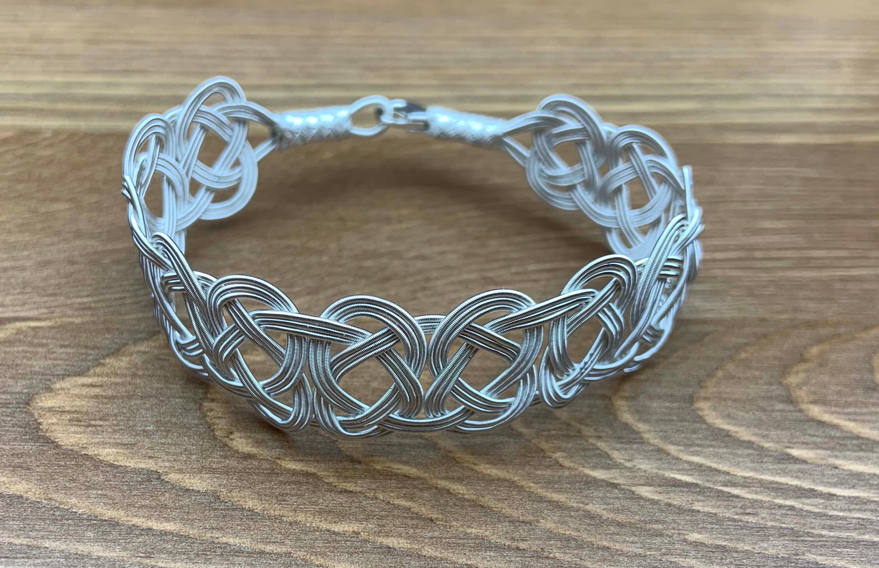 Ethereal Elegance: Handcrafted Sterling Silver Knot Bracelet