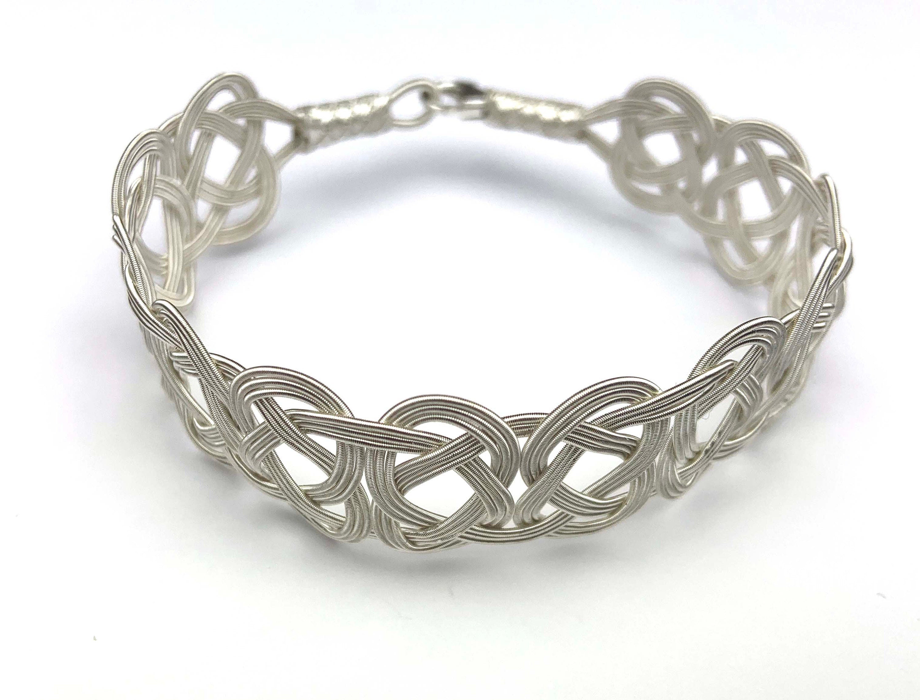 Ethereal Elegance: Handcrafted Sterling Silver Knot Bracelet