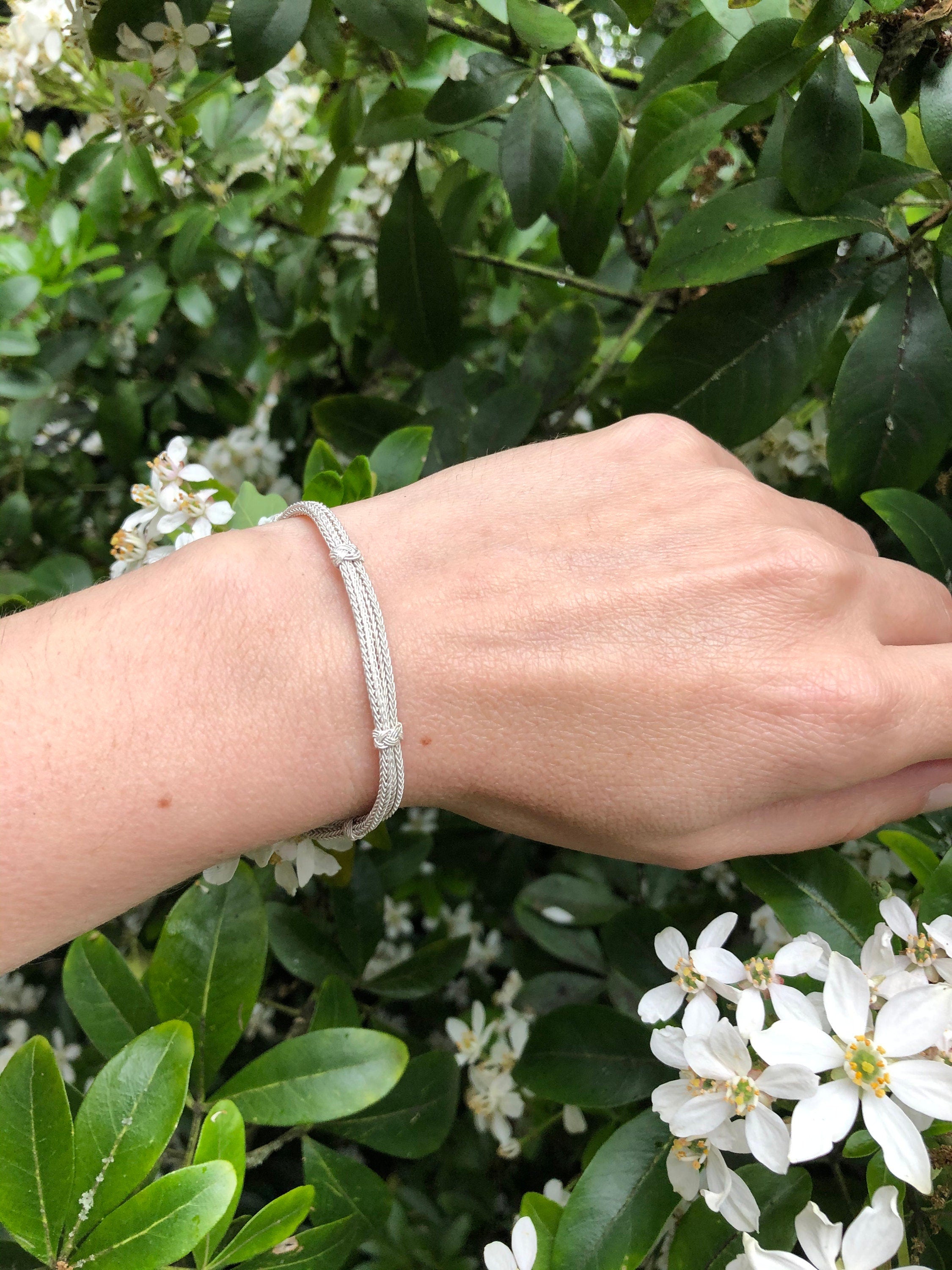 Show your love for your Mum with this stylish, thin silver bracelet. It is made of high quality sterling silver, and it will make a beautiful and unique gift for her birthday.