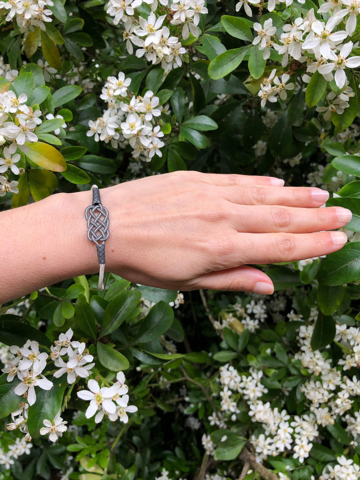 Intricate Silver Braided Knot Bracelet