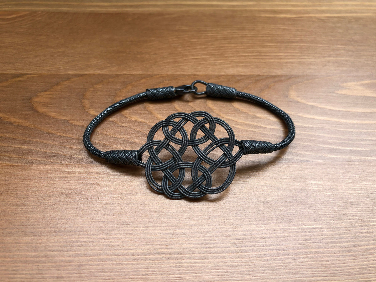 Midnight Mystique: Black Sterling Silver Braided Knot Bracelet