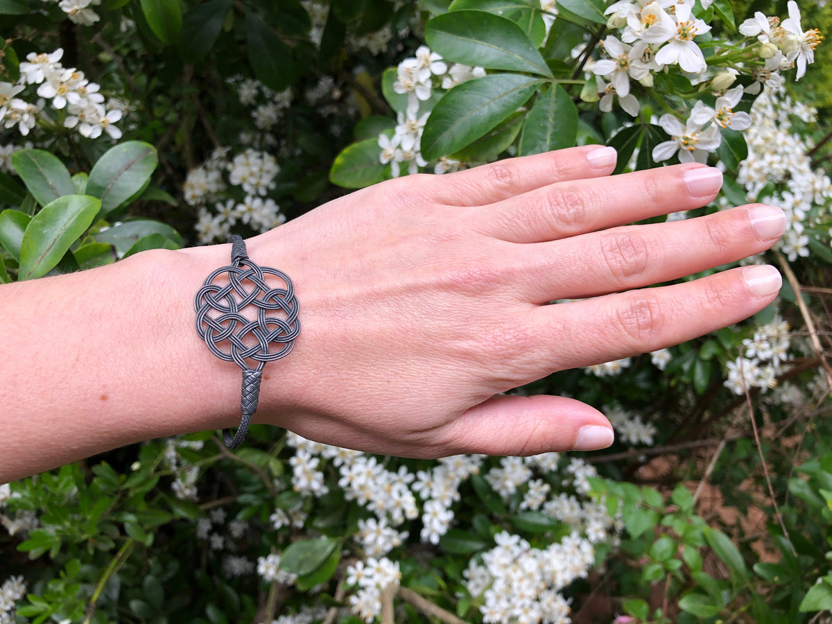 Midnight Mystique: Black Sterling Silver Braided Knot Bracelet