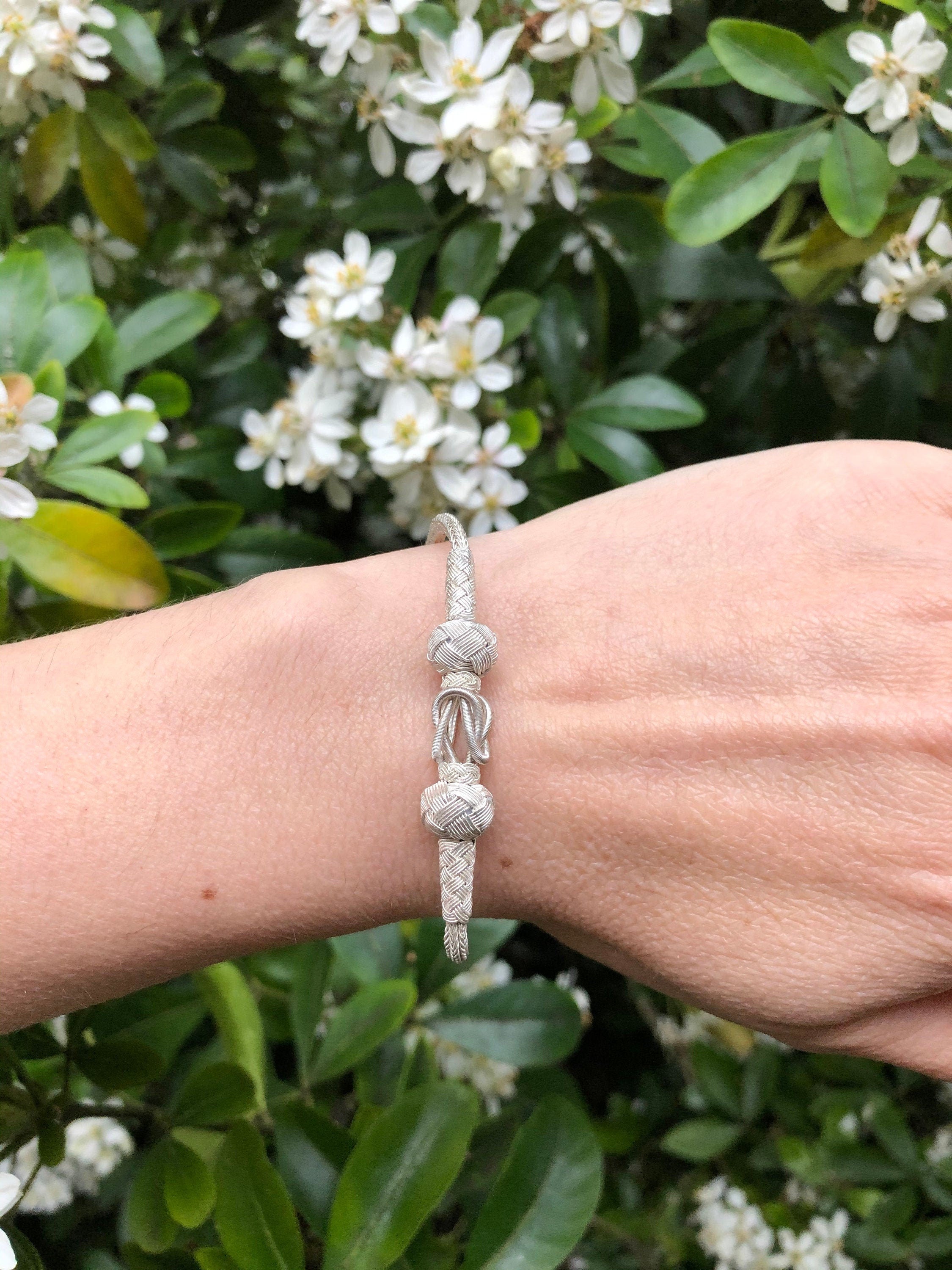 Bring elegance and beauty to your woman with our sterling silver braided bracelets. Our designs are inspired by nature and feature a beautiful silver design that is sure to make your mom happy.