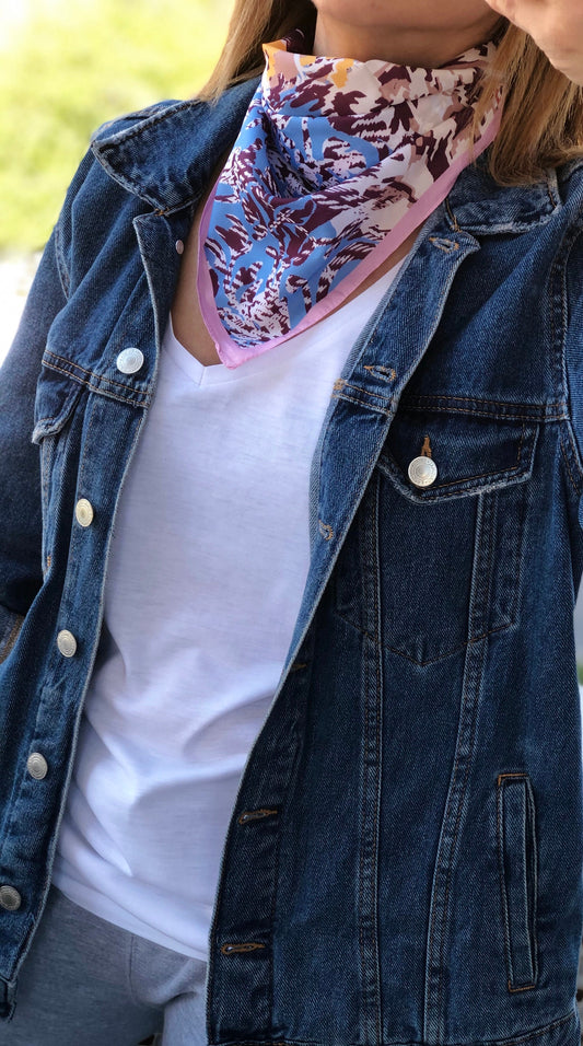 Transform your hairstyle with this pink silk hair scarf, perfect for tying in a bow or knot.