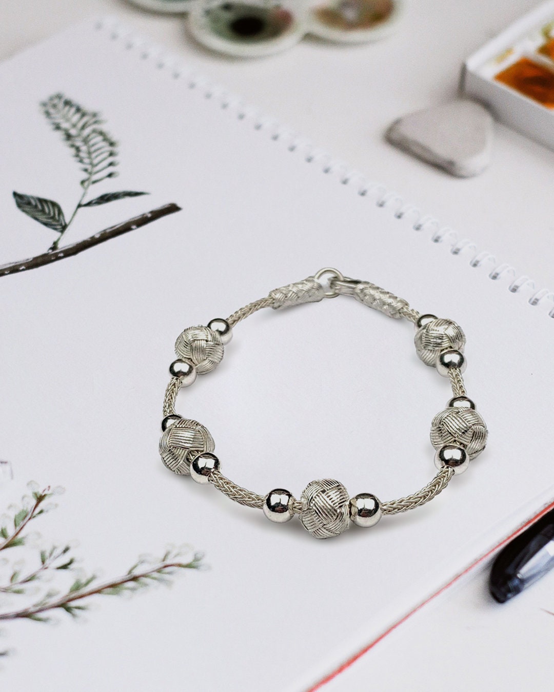This beautiful Silver Ball Bracelet is the perfect everyday bracelet! It's stylish, unique, and perfect for anyone.