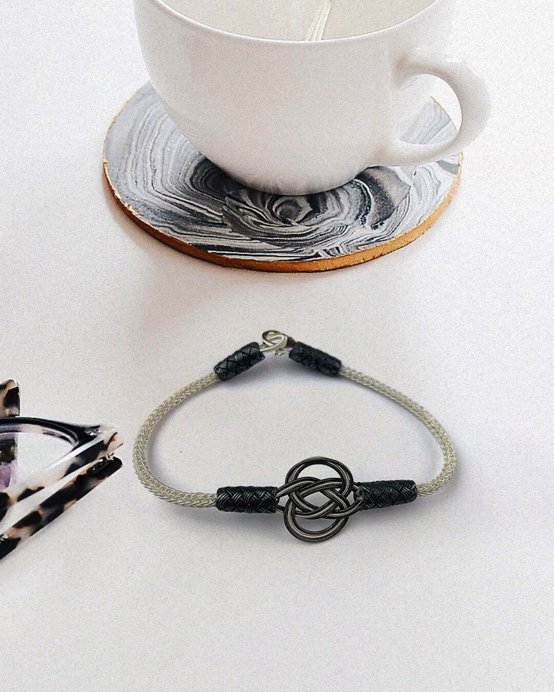 Sterling Silver and Black Braided Bracelet - Elegant Knot Design