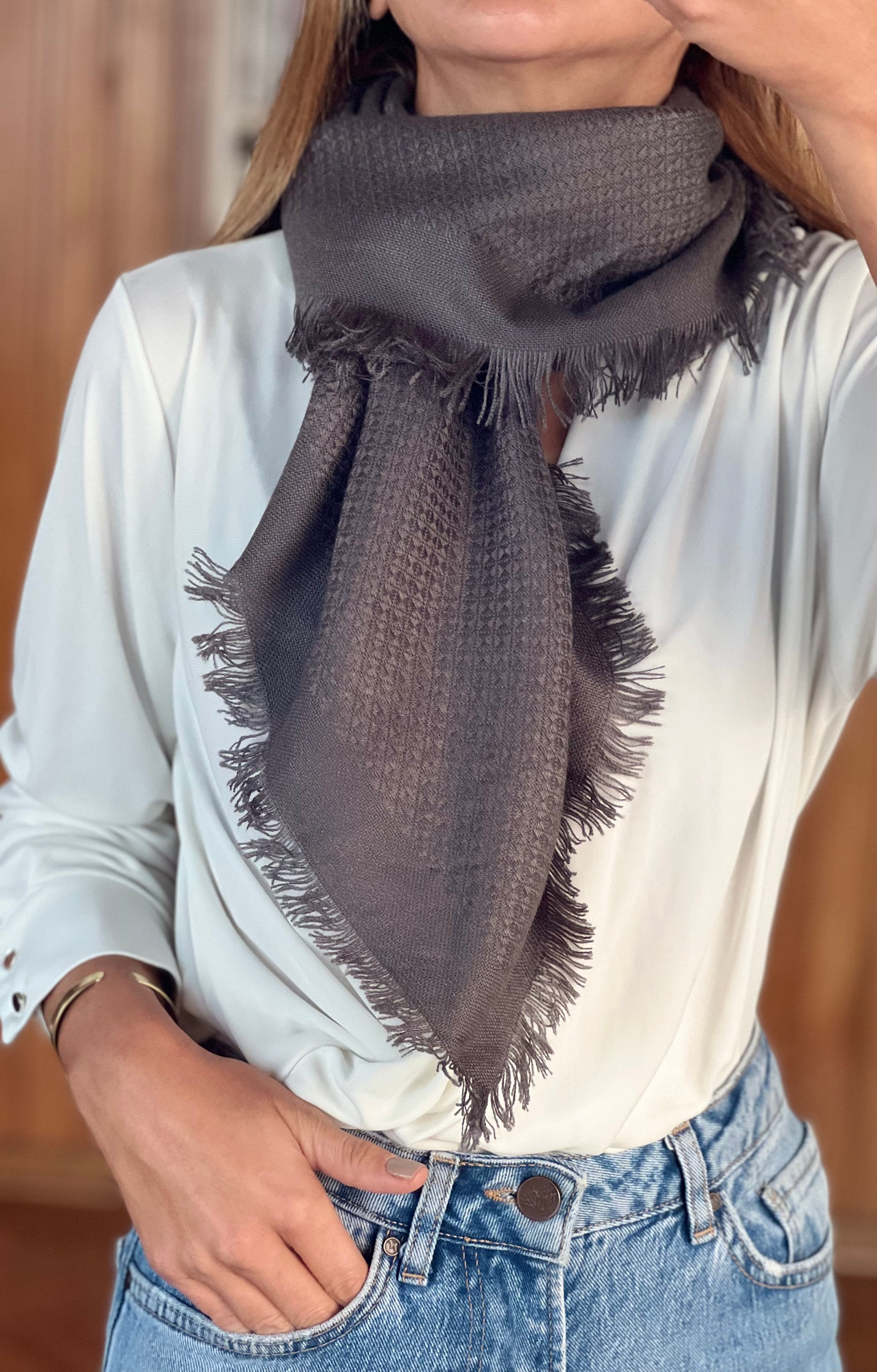 Add a touch of simplicity to your outfit with this Square Solid Scarf, featuring a classic solid color