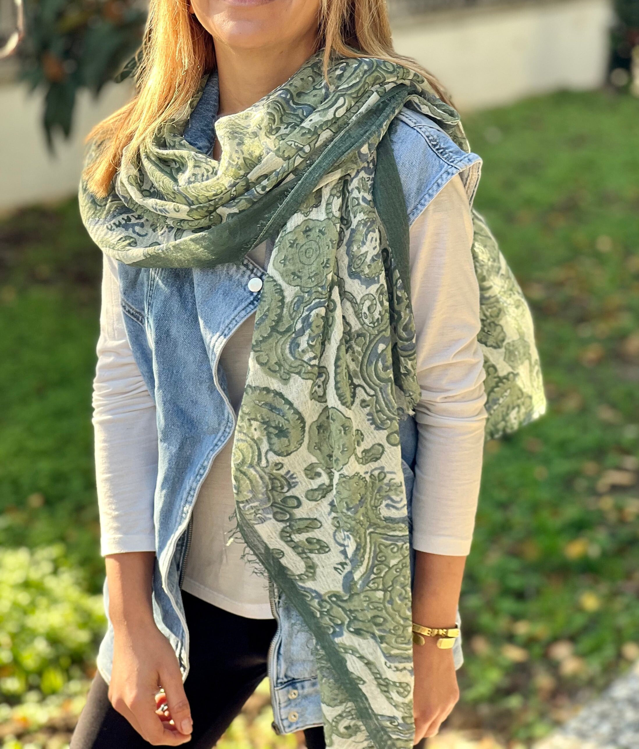 Travel easily and style up at the same time with this versatile designer scarf made of 100% cotton. With its ethnic pattern green color that goes with just about anything, it is the perfect travel companion.