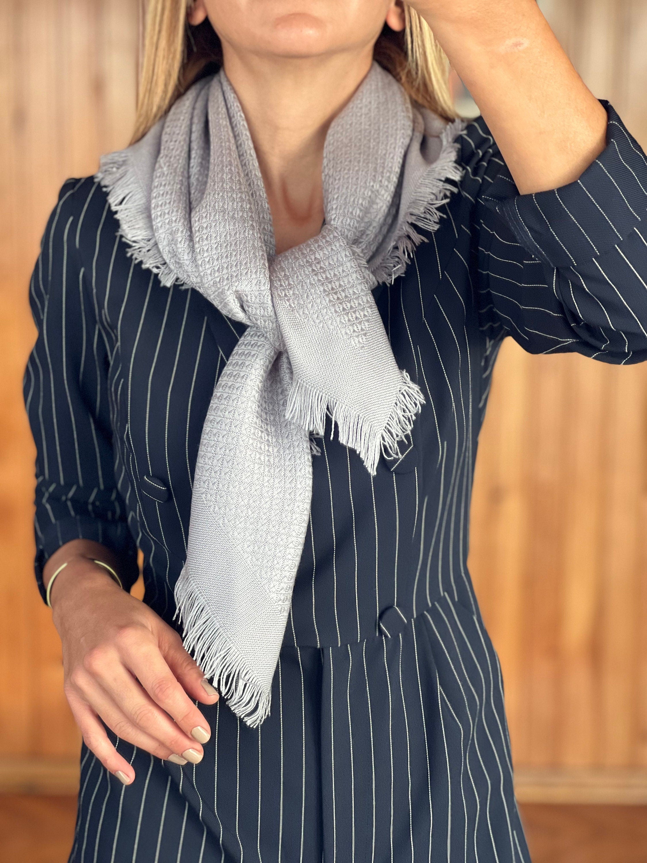 A classic accessory, this light grey square solid scarf makes a great gift for her.