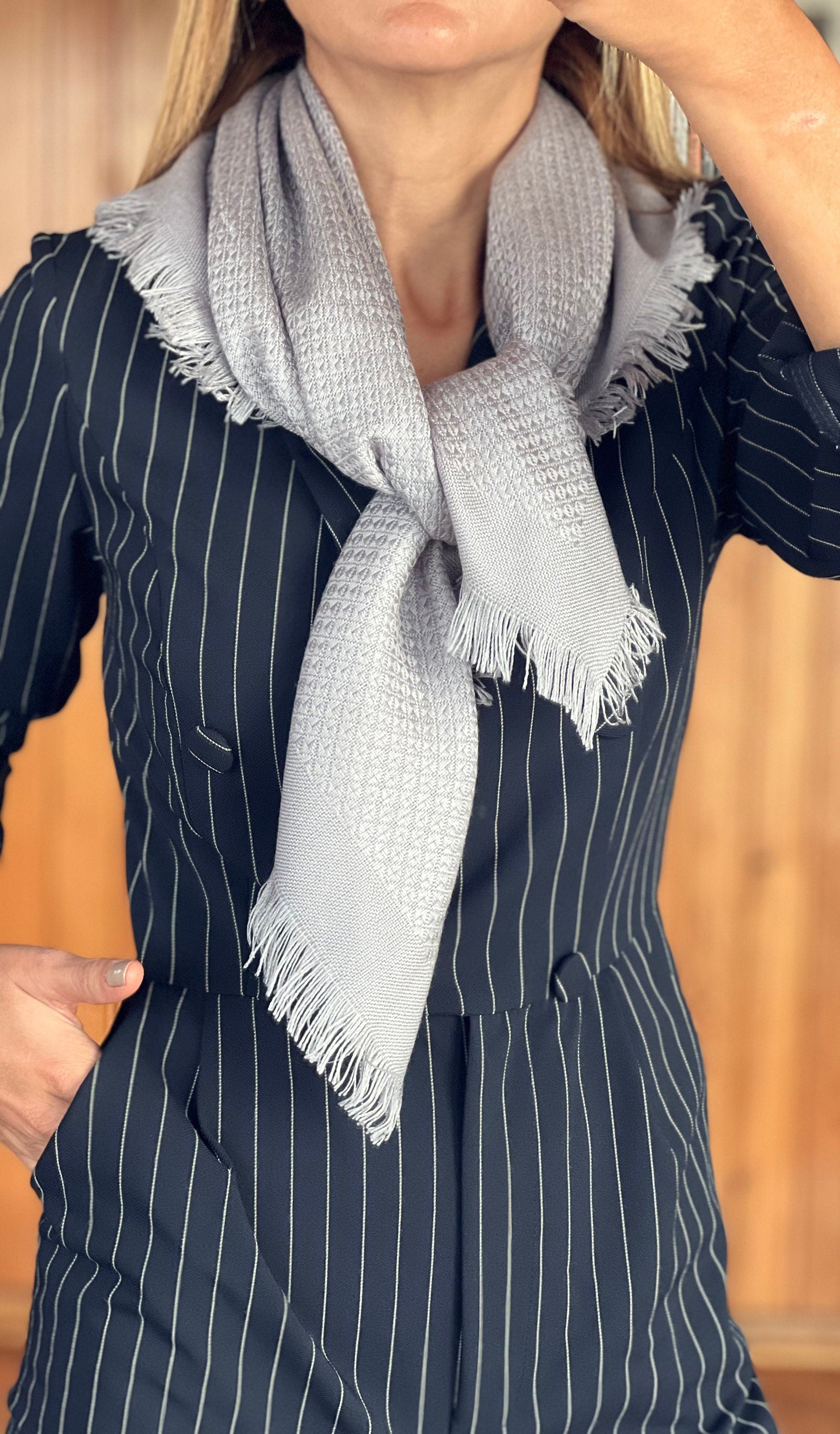 Stay cozy with this soft and warm light grey cotton wool blend scarf, perfect for women.