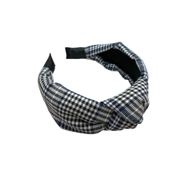 Upgrade your hairstyle with this white and black crepe headband, perfect for everyday wear or special occasions.