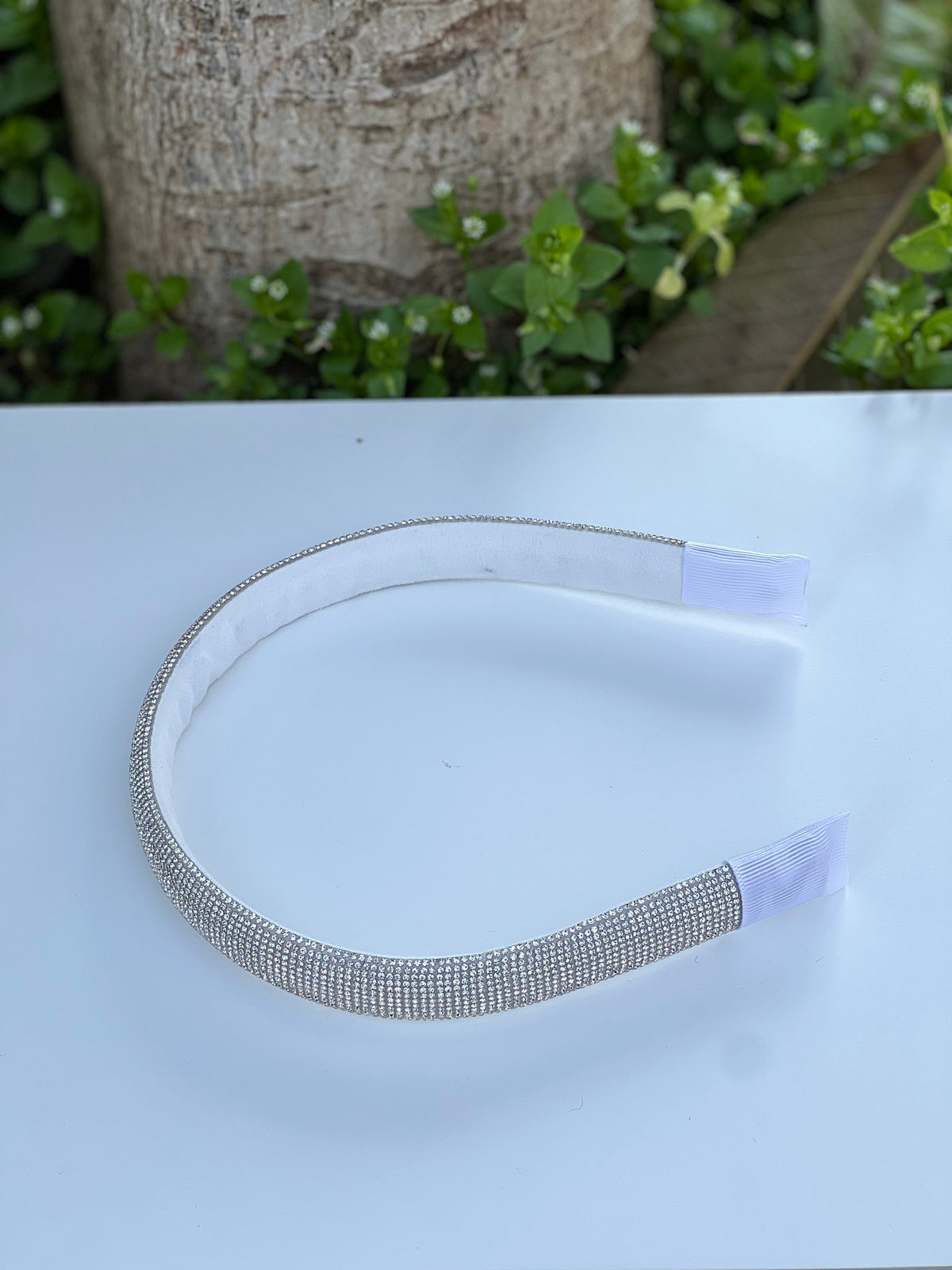 Complete your bridesmaid's look with this elegant bridesmaid headpiece, perfect for any wedding day hairstyle.