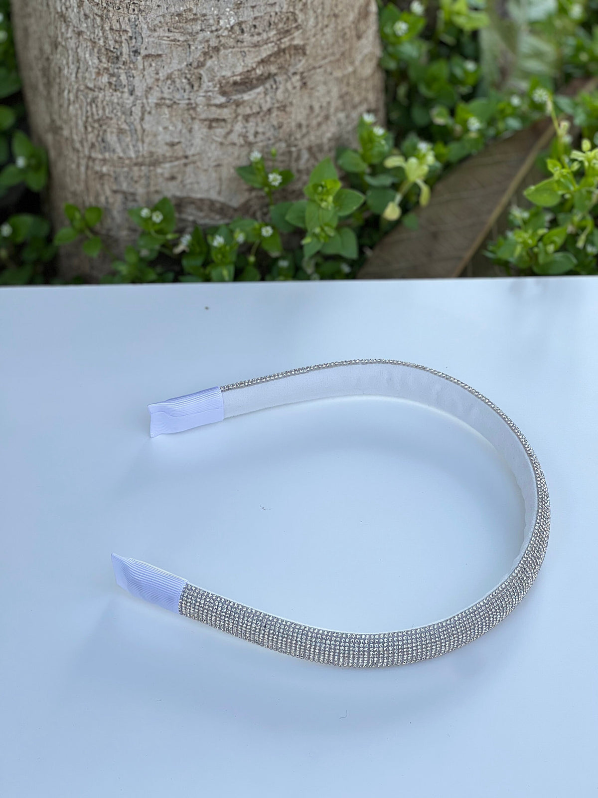 Make a statement on your wedding day with this sparkling crystal tiara headband, perfect for any boho bride.
