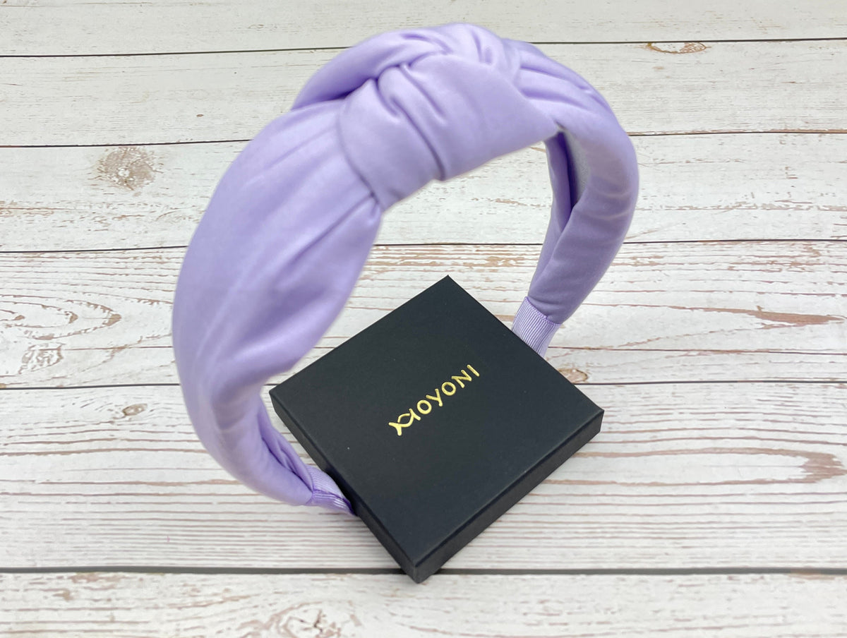 This beautiful lavender twist headband is perfect for adding a touch of femininity to your look. The twist design adds a unique touch to any hairstyle, making it perfect for both casual and formal occasions.
