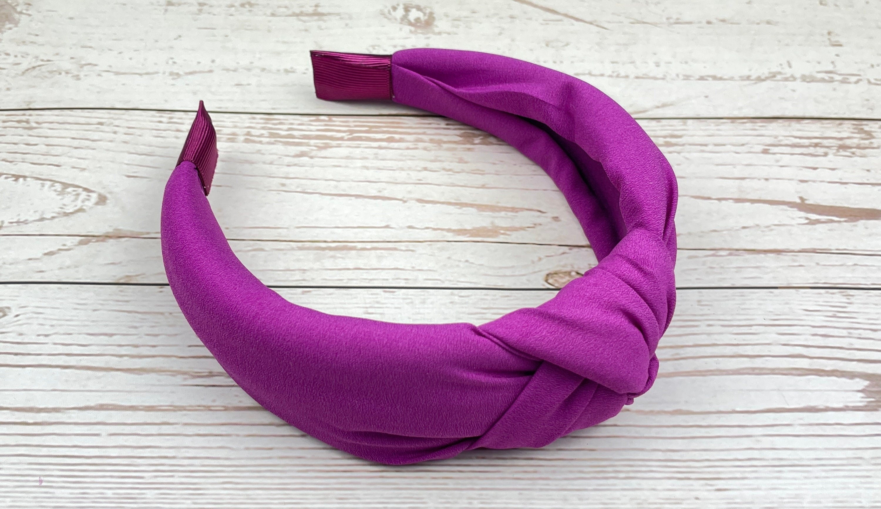 Get a modern look with this Dark Pink Knotted Headband, suitable for women and girls of all ages