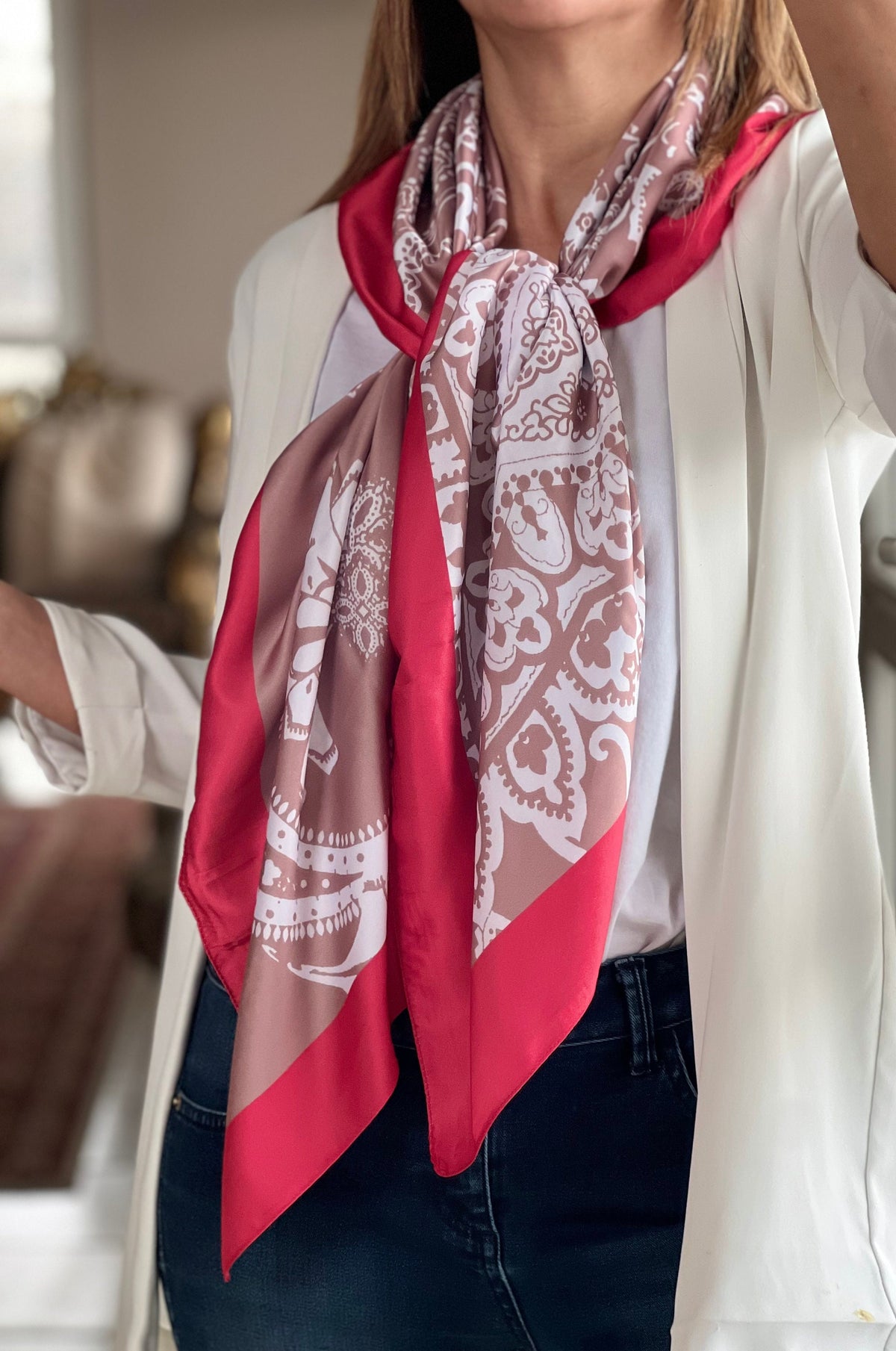 Make a statement with our bold and beautiful red, cream and white color pattern scarf. Whether you're dressing up for a special occasion or simply running errands, our scarf will add the perfect finishing touch to any outfit.