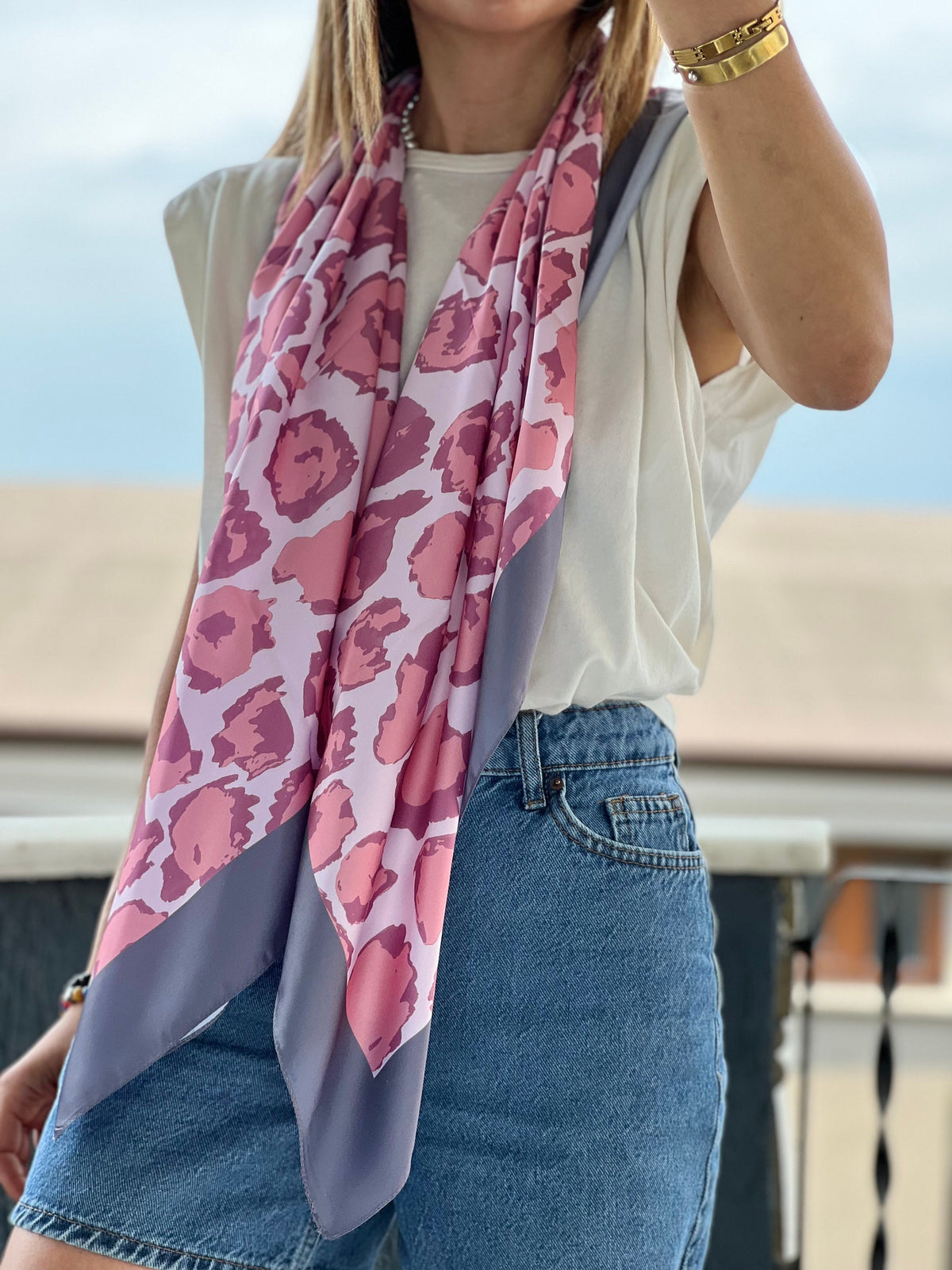 Navy blue neck scarf with a silky smooth texture and luxurious feel.