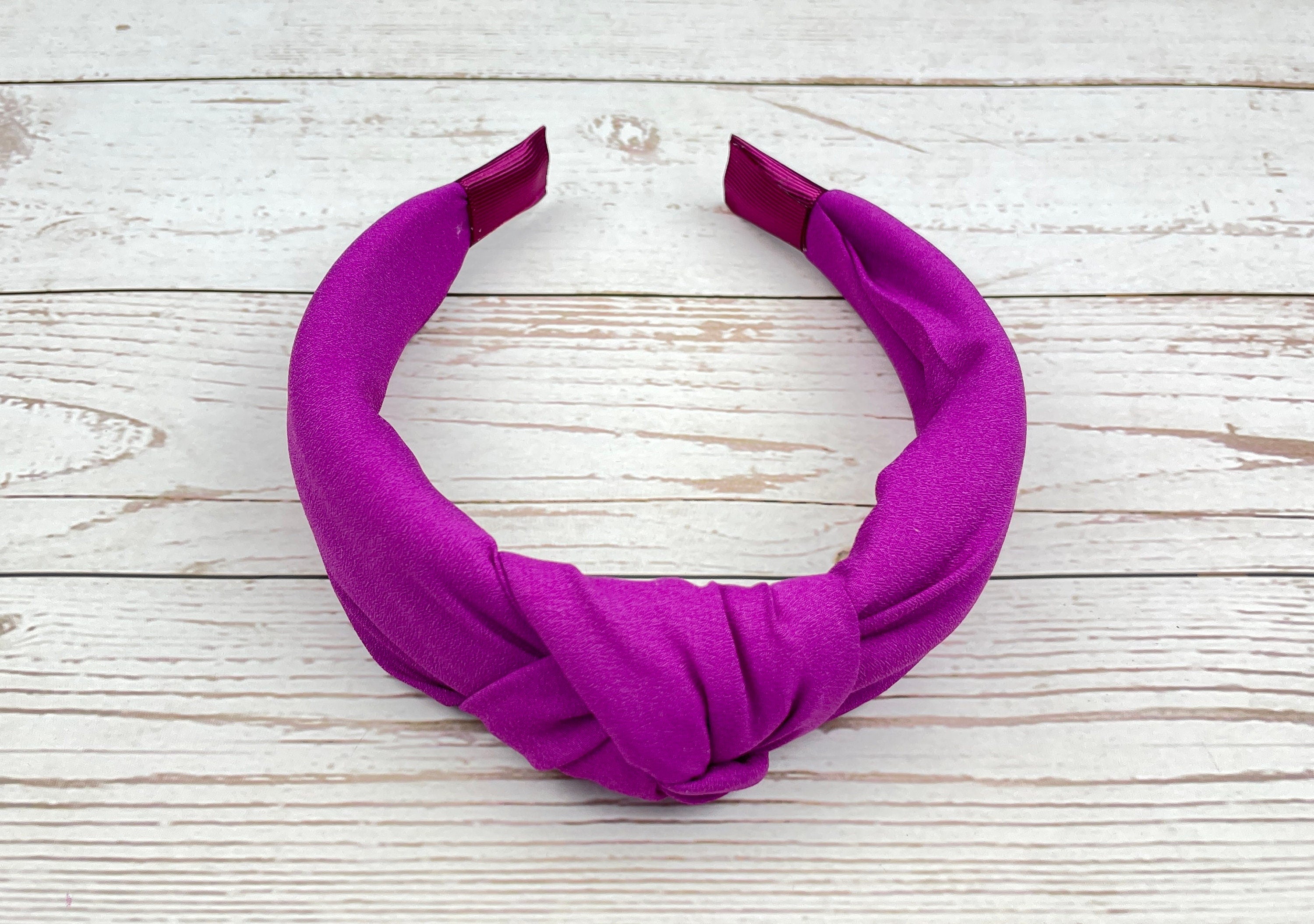 Get a modern look with this Dark Pink Knotted Headband, suitable for women and girls of all ages