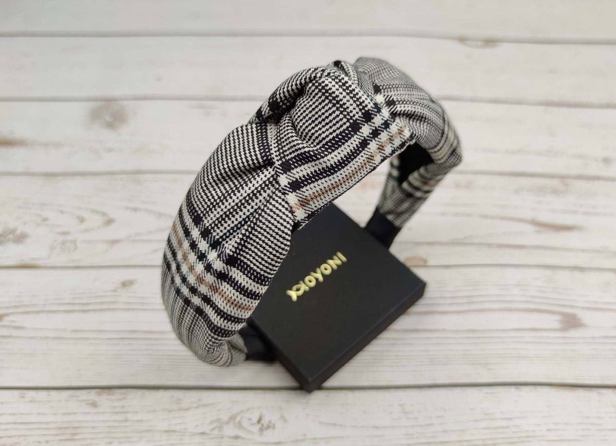 On-Trend Crepe Headband: Enhance your style with this versatile white and black striped headband. Ideal for college girls, it adds a fashionable touch to any outfit.