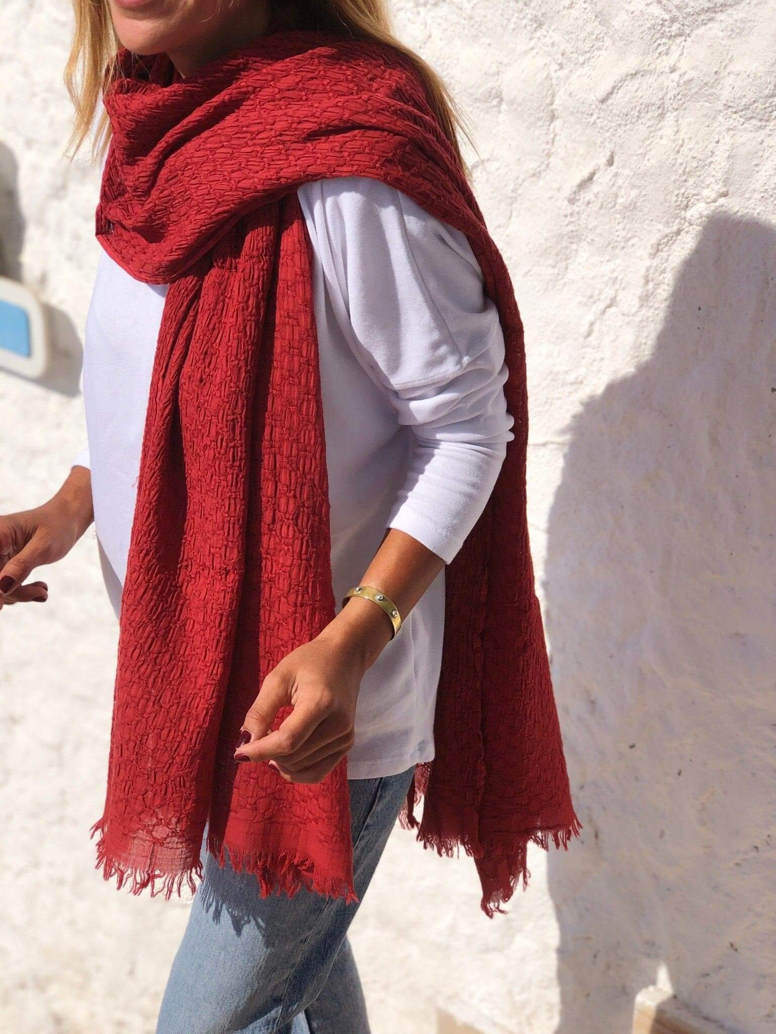 Treat someone special to a gift that keeps on giving with this 100% organic cotton red large rectangle scarf. Perfect for Valentines Day, this warm and cozy burgundy scarf is ideal for all seasons and adds a pop of color to any outfit.