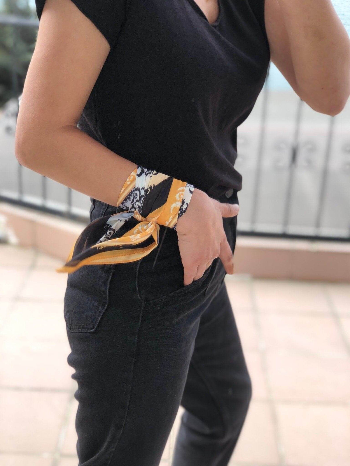 Black Gold White Pattern Neck Scarf: Make a statement with this bold neck scarf. The black, gold and white pattern is both classic and edgy, making it the perfect addition to any outfit.