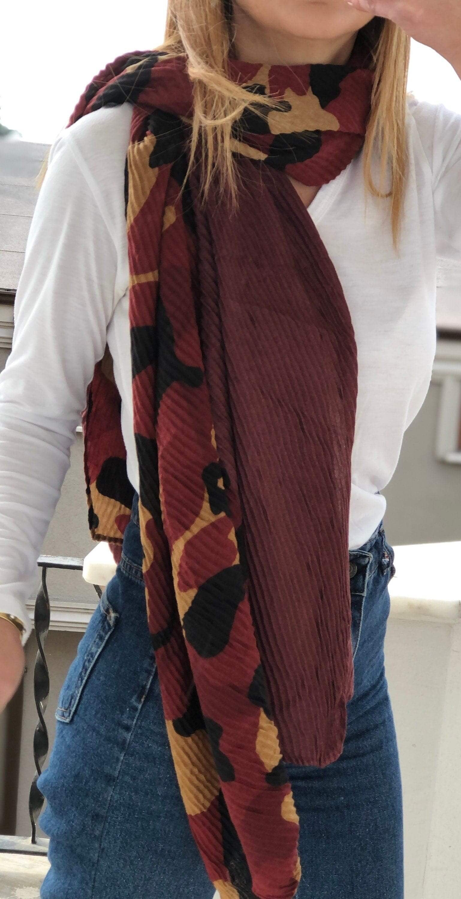 Elevate your style game with this trendy and chic scarf that&#39;s sure to turn heads wherever you go