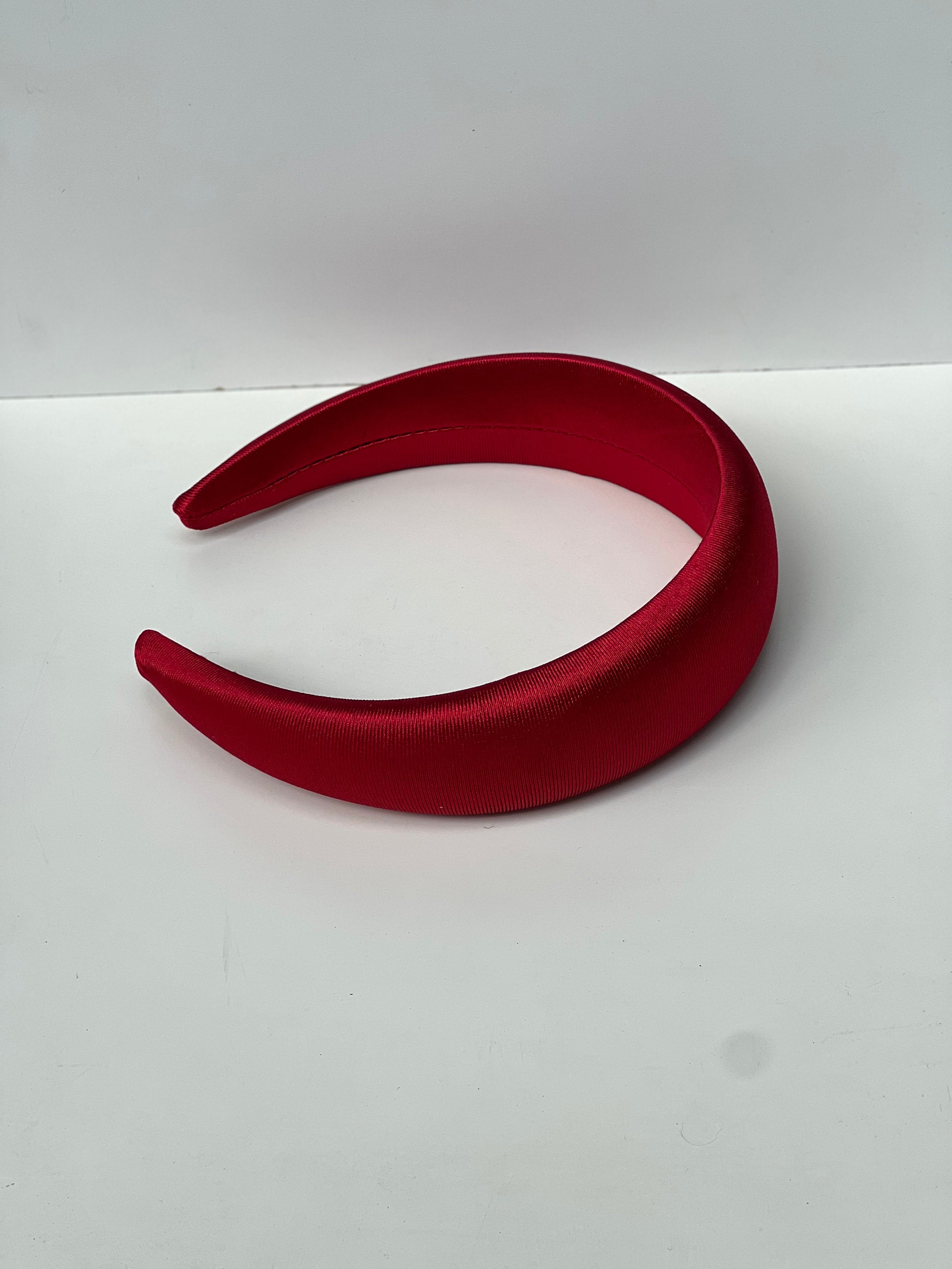 Add a pop of color to your look with this solid red satin headband, a versatile and elegant accessory for women.