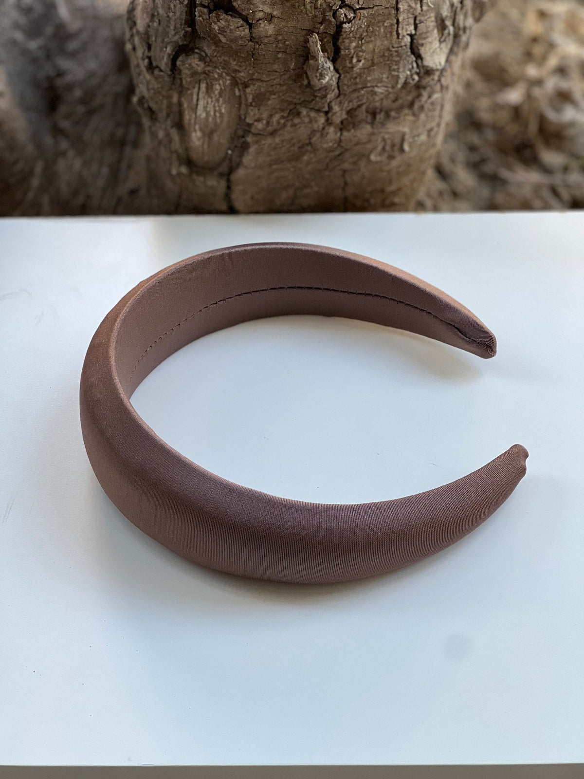 Add a touch of neutral elegance to your hairstyle with our Neutral Color Band.